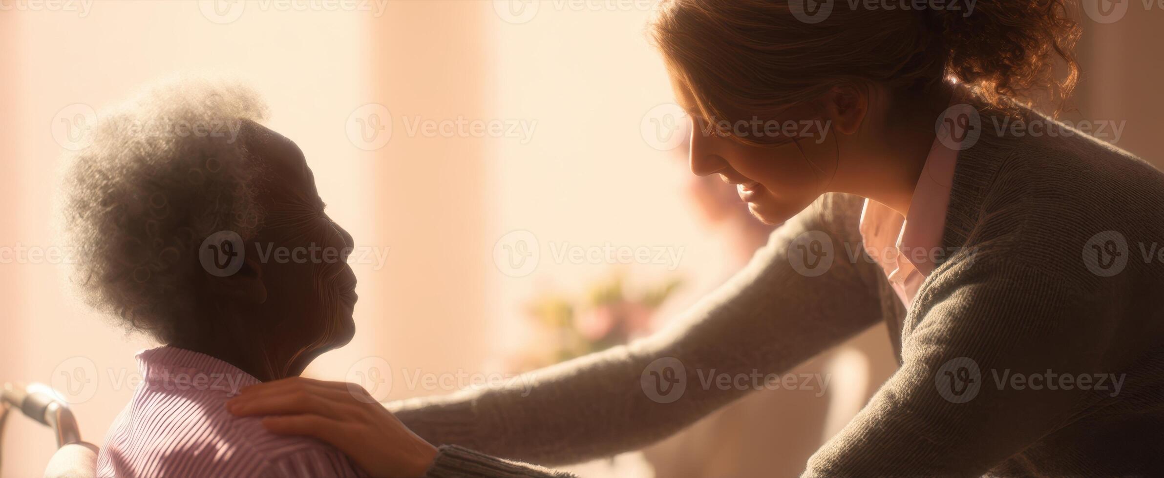The tender moment between a caregiver and an elderly resident in soft light. photo