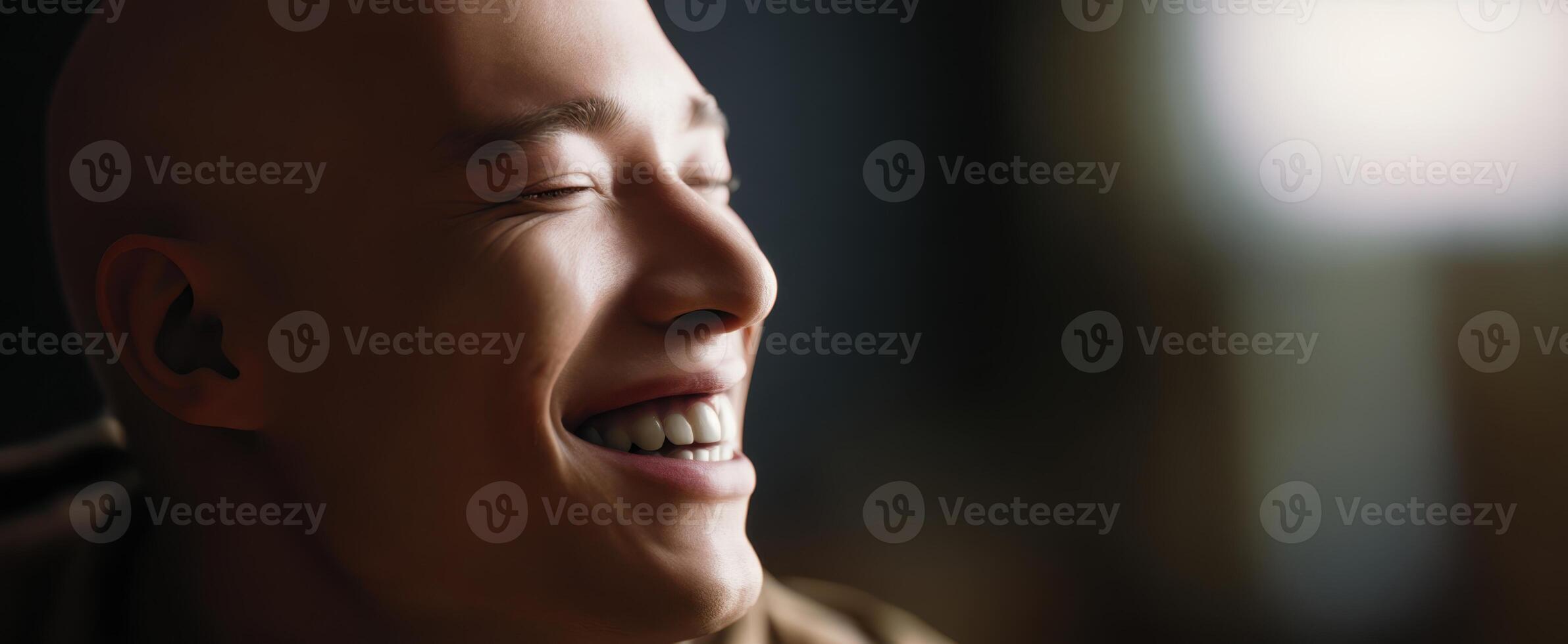 The joyful expression of a young man enjoying music in a candid moment. photo
