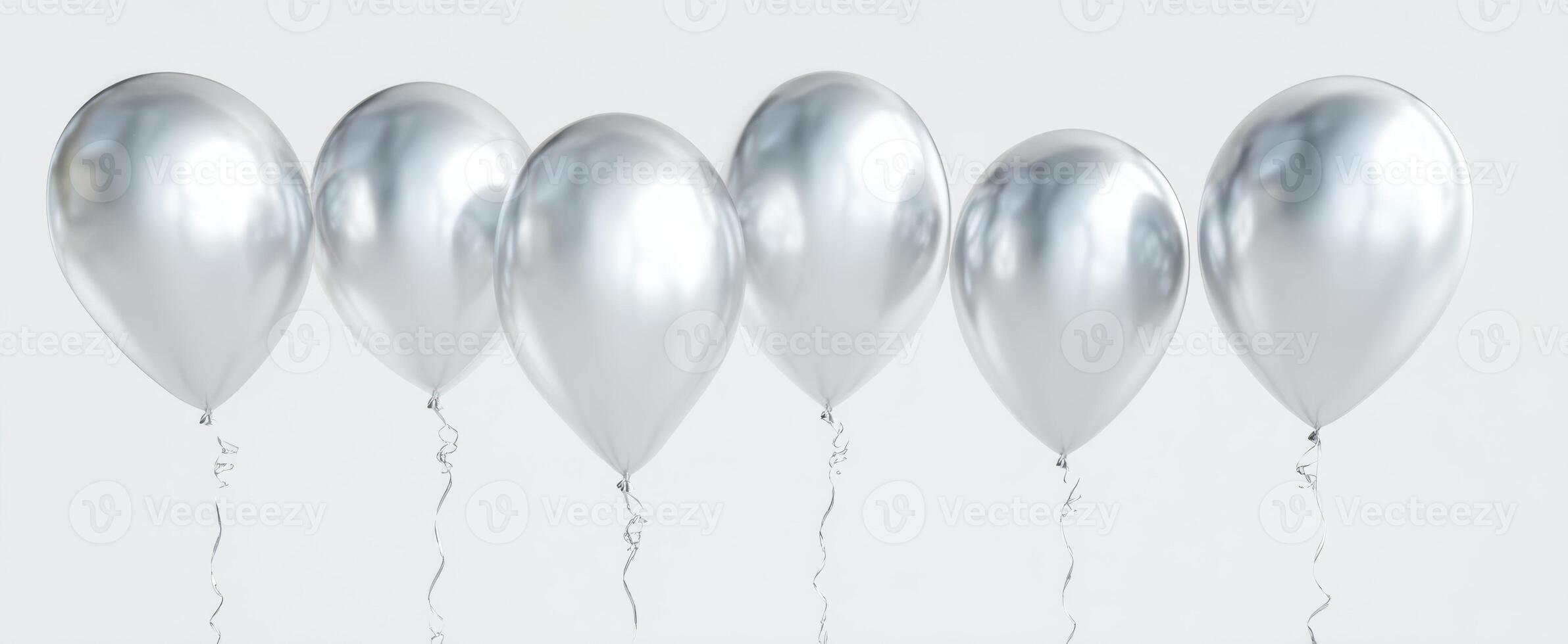 The shiny silver balloons floating against a simple white background. photo