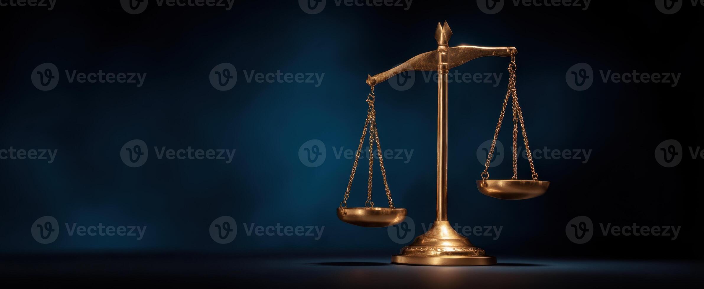 The Elegant Gold Scales of Justice on a Dark Background. photo