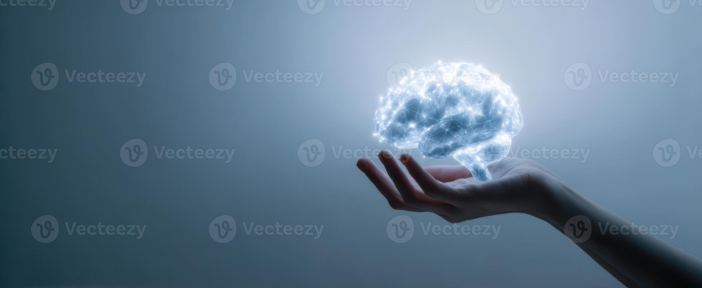 The Hand Holding a Digital Representation of a Brain for Creativity and Innovation photo
