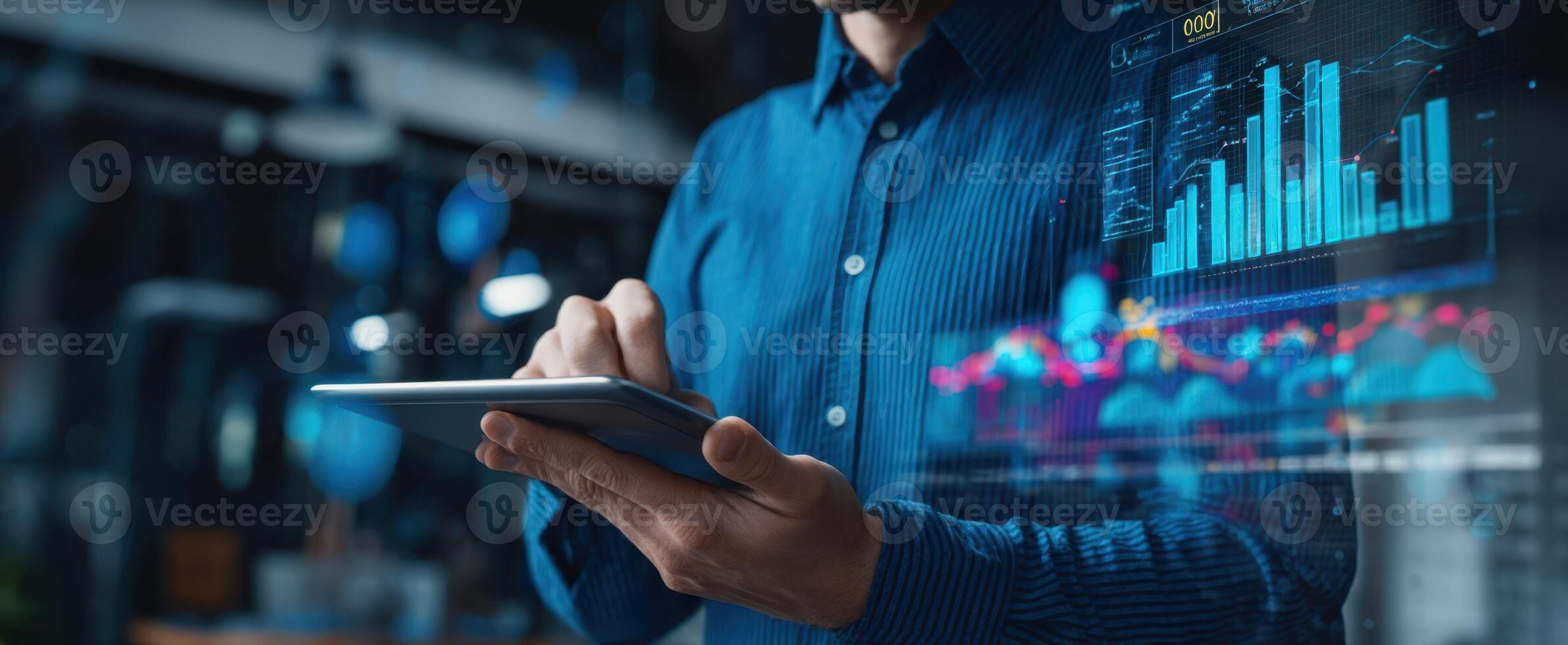 The professional using a tablet for analyzing digital business data and trends. photo