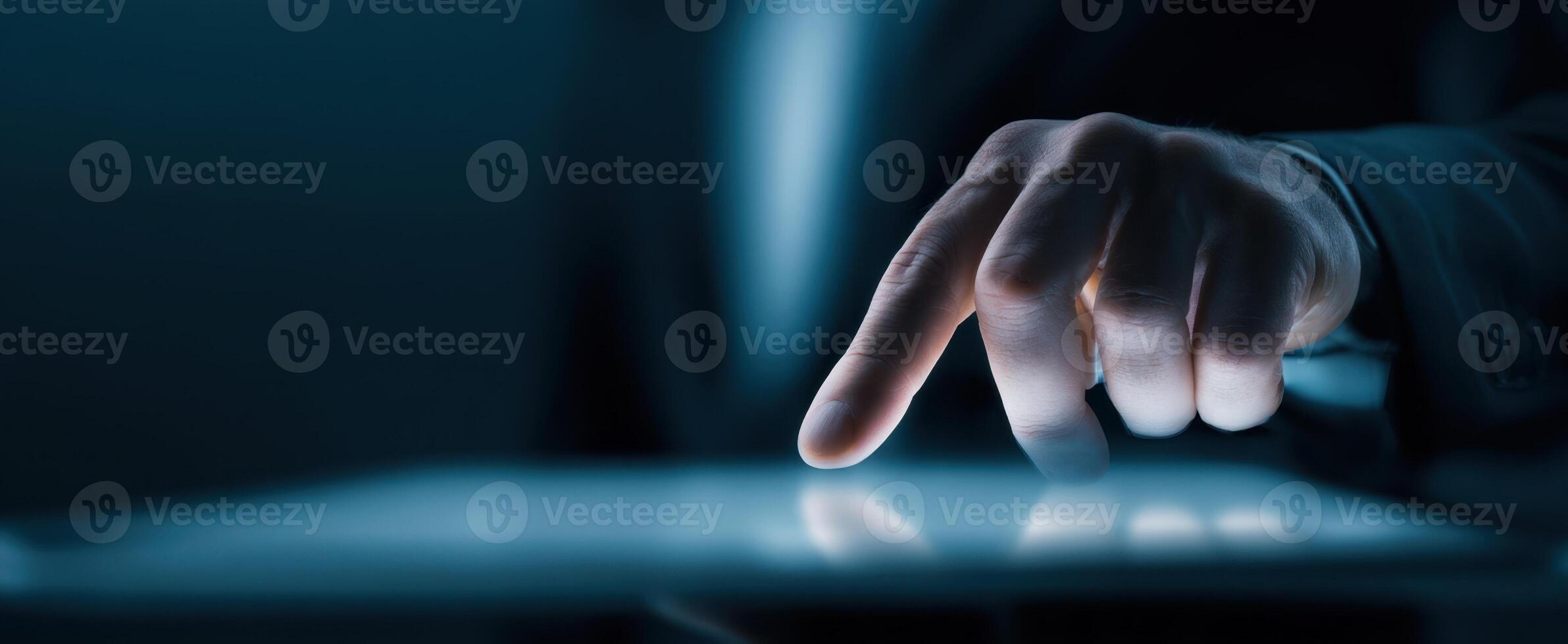 The Businessman Interacting with a Touchscreen Device in a Modern Office Environment photo