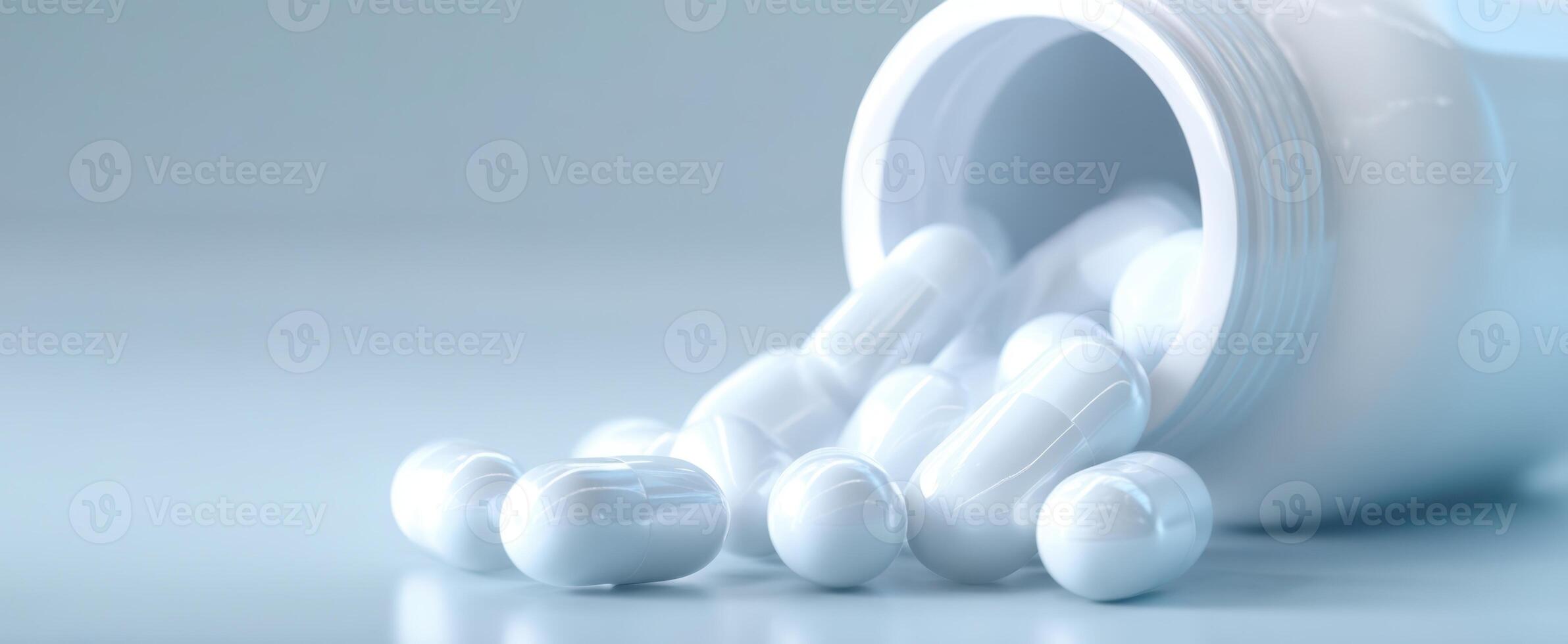 The white pills and bottle spilling on a smooth surface. photo
