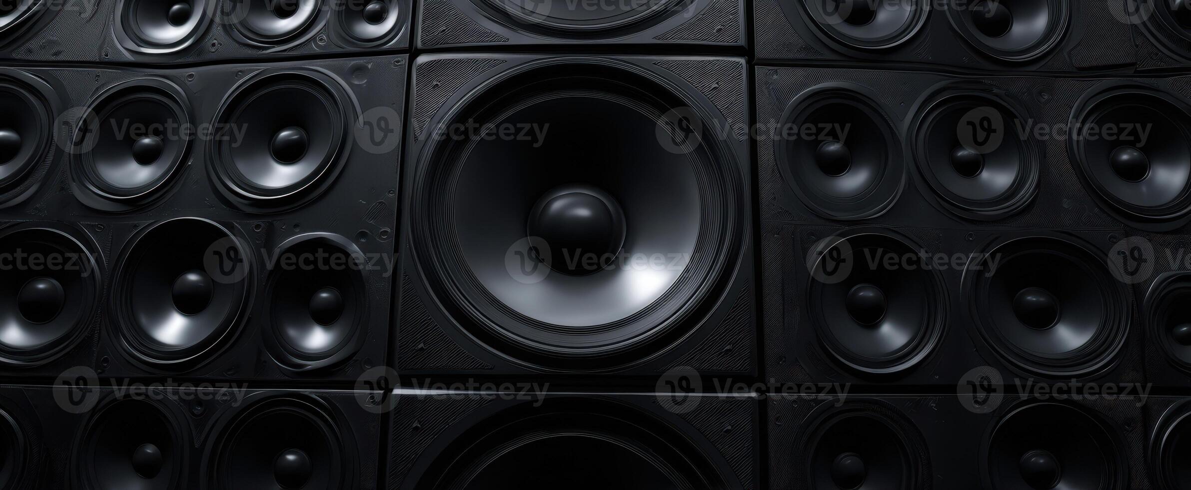 The massive collection of black speakers creating an immersive sound experience. photo