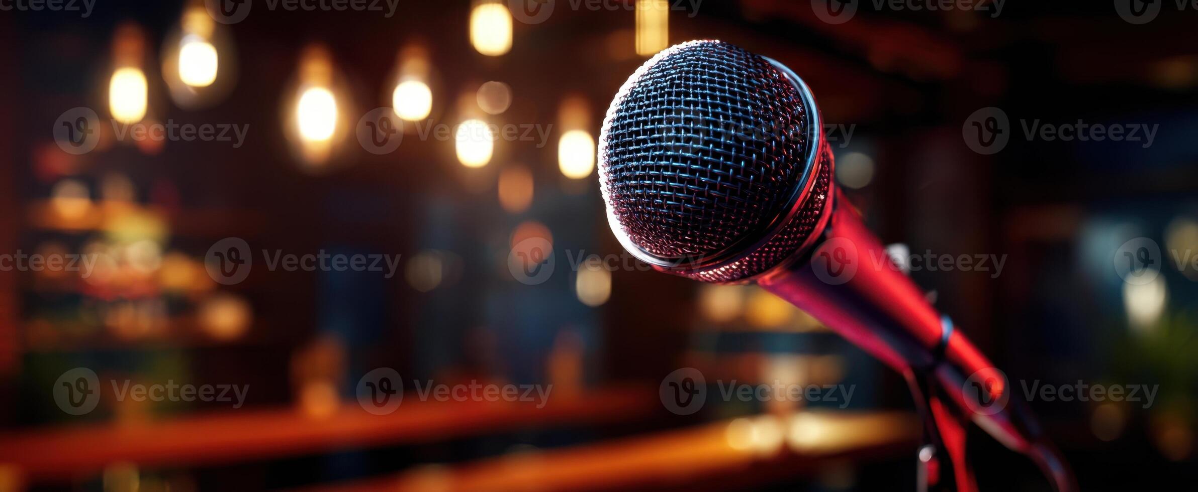 The microphone ready for a vibrant performance in a lively atmosphere. photo