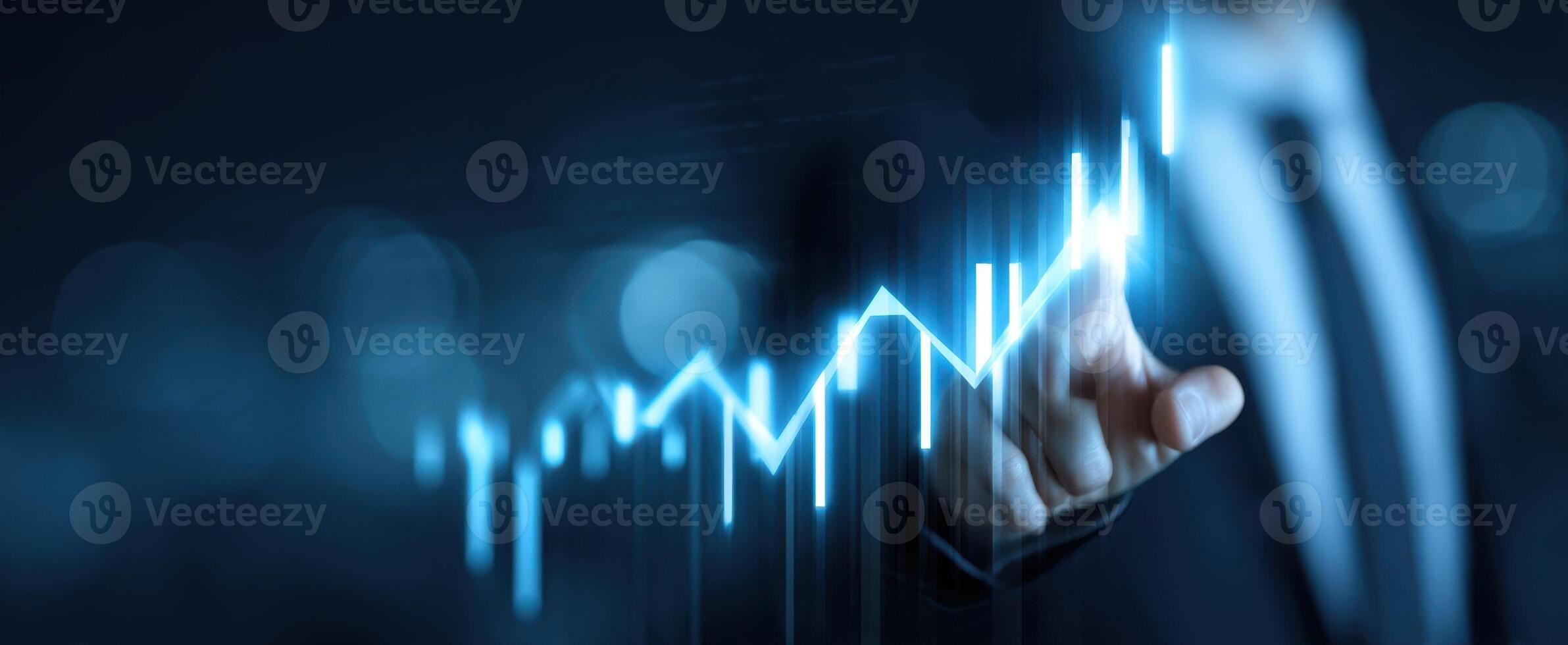 The Businessman Pointing Towards a Rising Graphical Data Trend photo