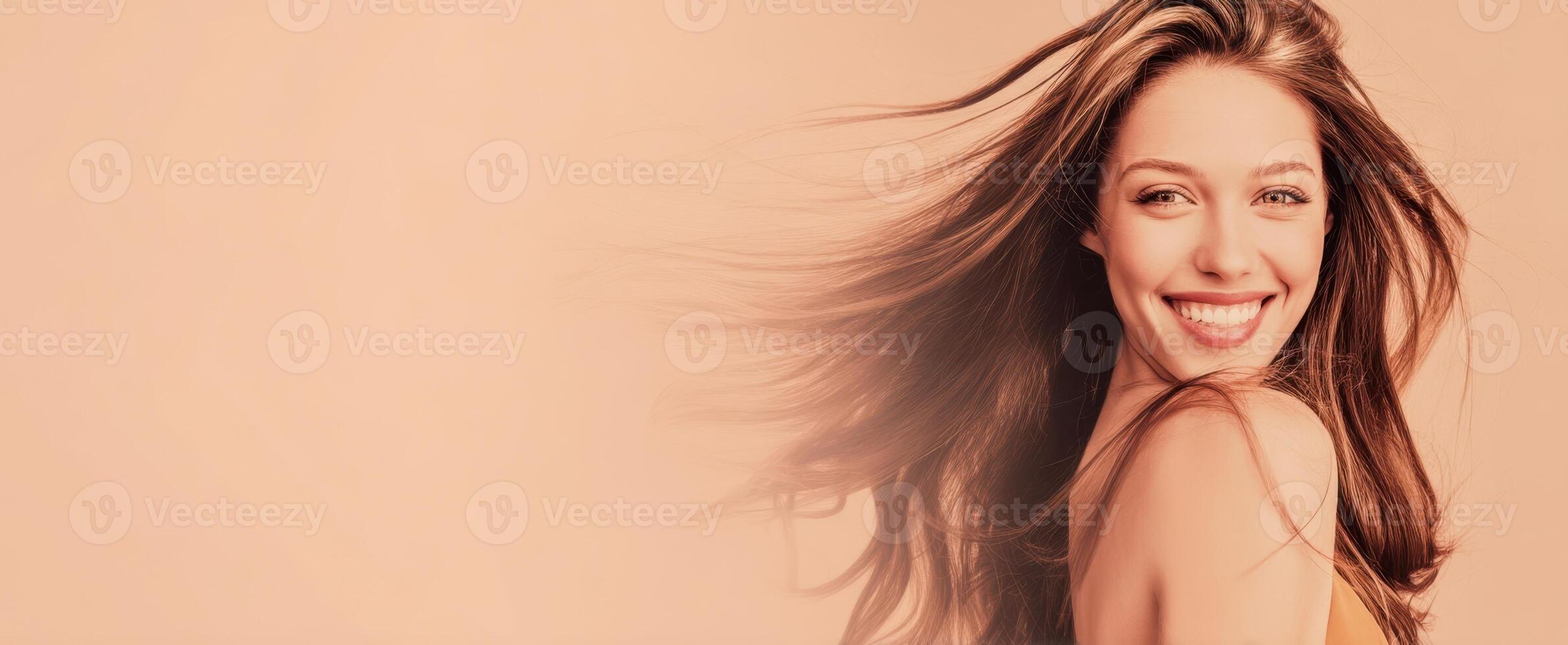 The joyful woman with flowing hair exuding confidence and beauty. photo