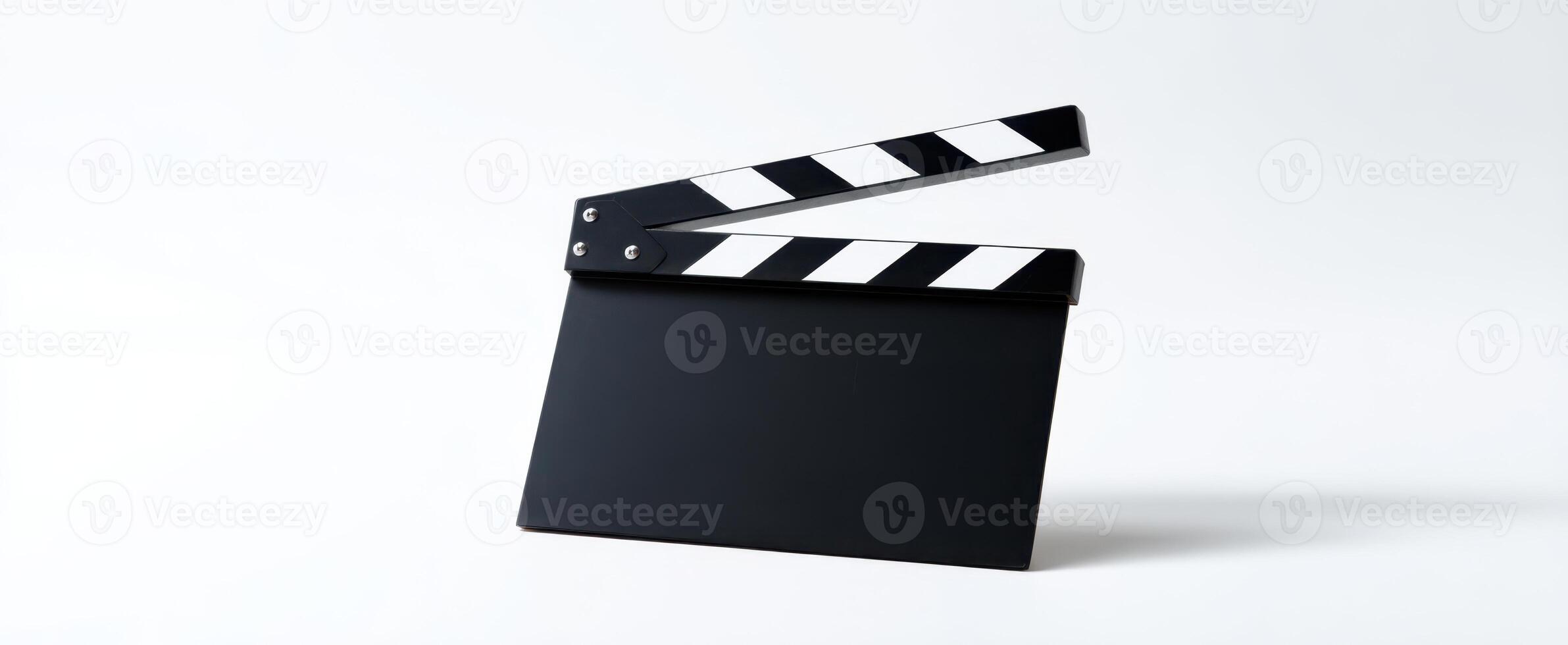 The clapperboard symbolizes creativity and storytelling in film production. photo