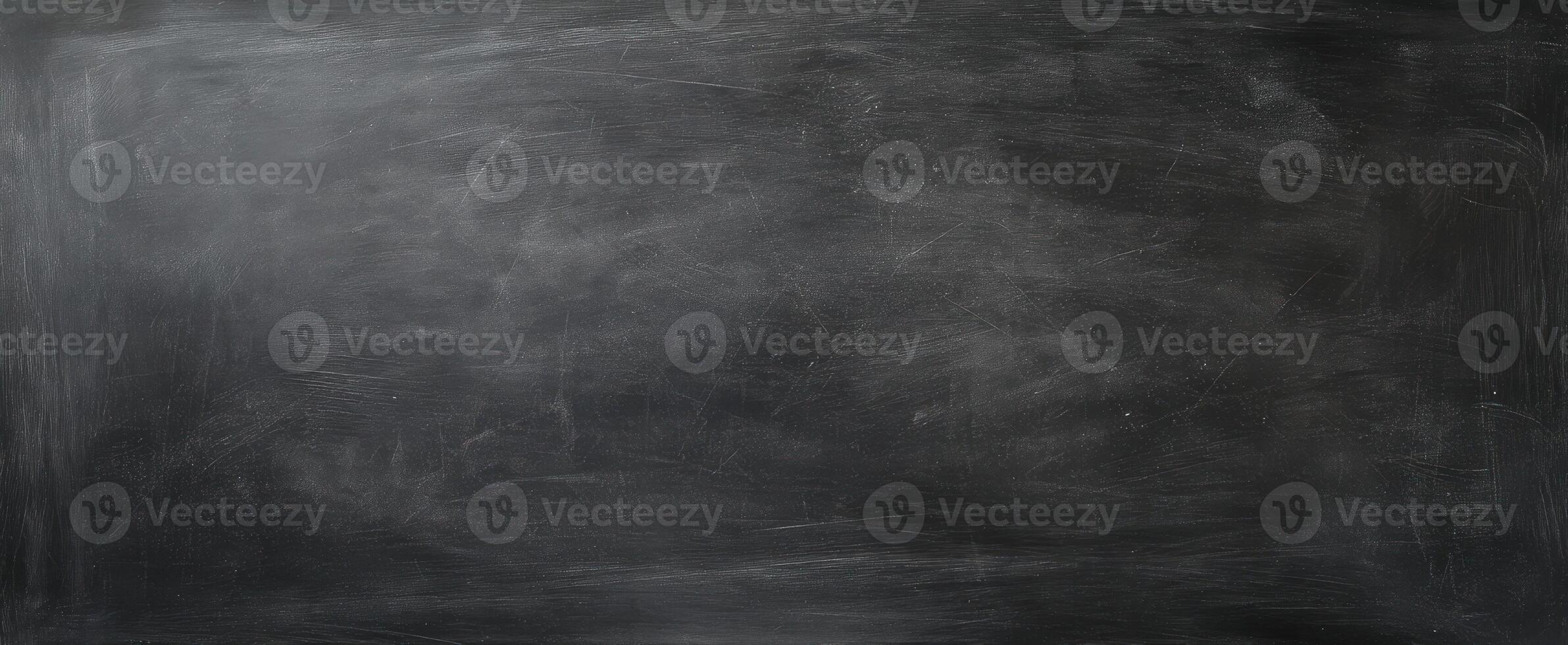 The empty chalkboard capturing a timeless classroom atmosphere and learning potential photo