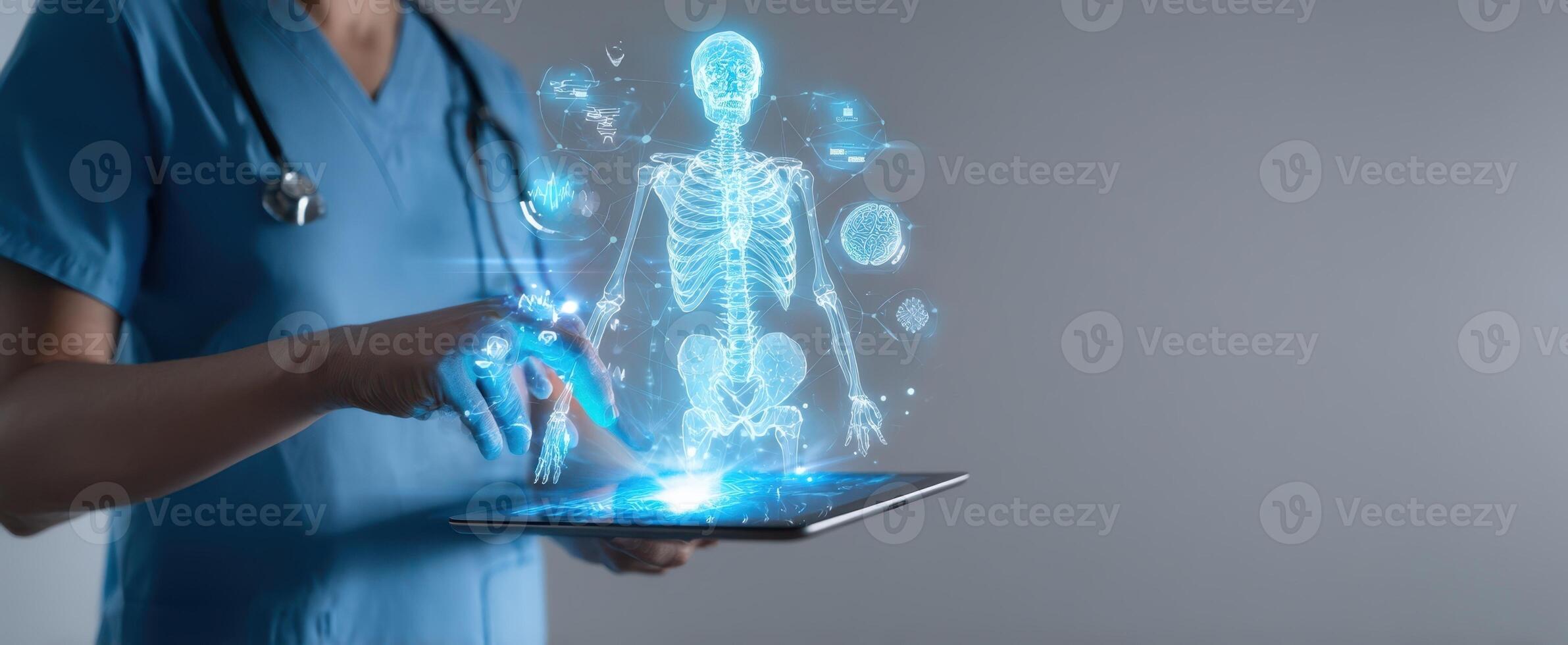 The healthcare professional interacting with a holographic skeleton display on a tablet. photo