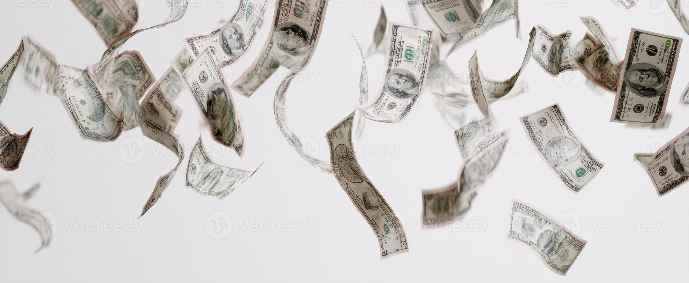 The flying dollar bills creating a sense of wealth and prosperity in the air. photo