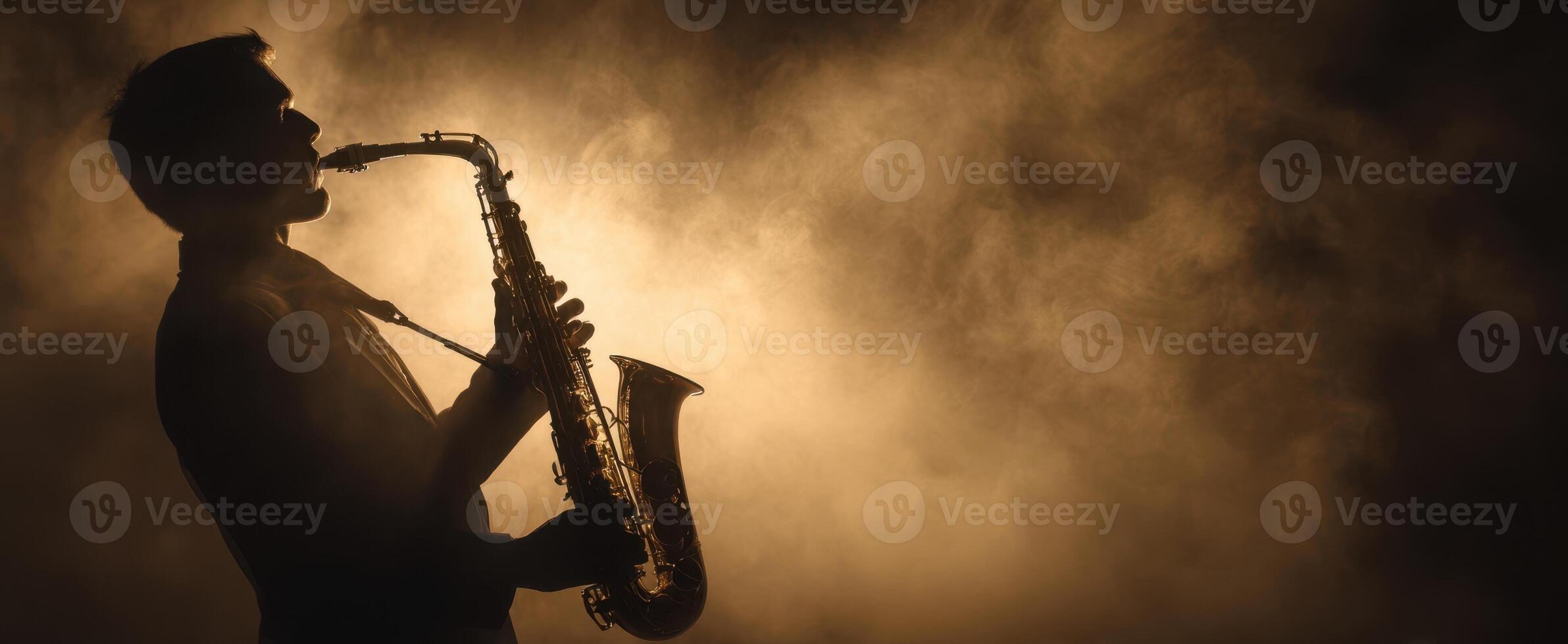The saxophonist creating soulful music in a misty atmosphere. photo