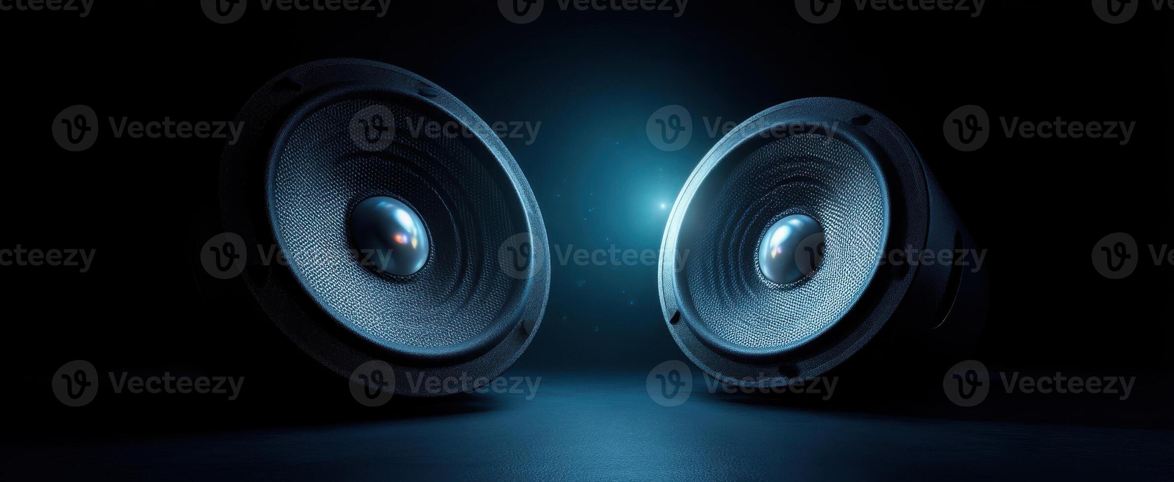 The dynamic dual speakers illuminated in a dark, moody atmosphere. photo
