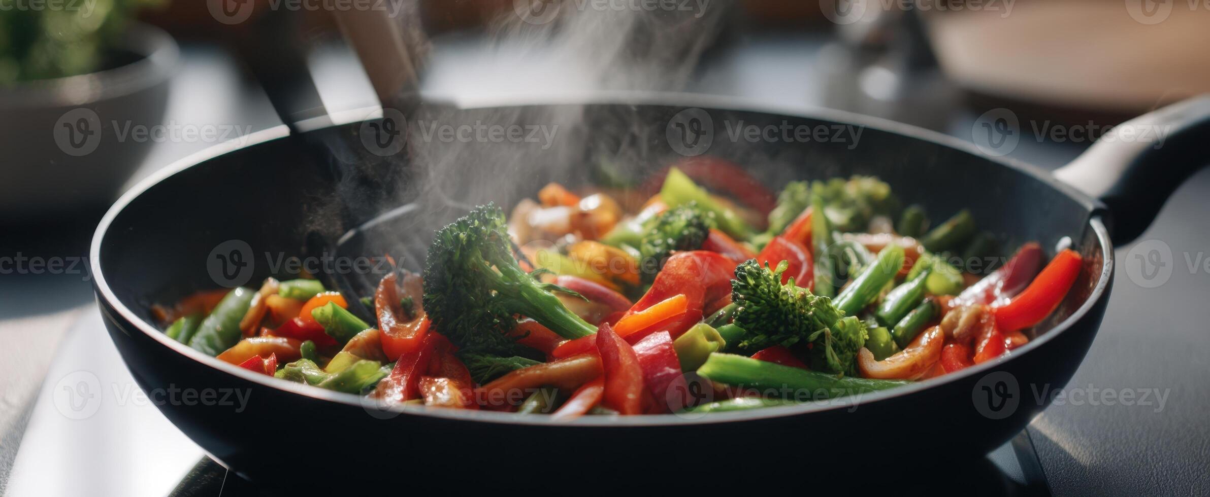 The colorful stir-fried vegetables in a sizzling skillet. photo