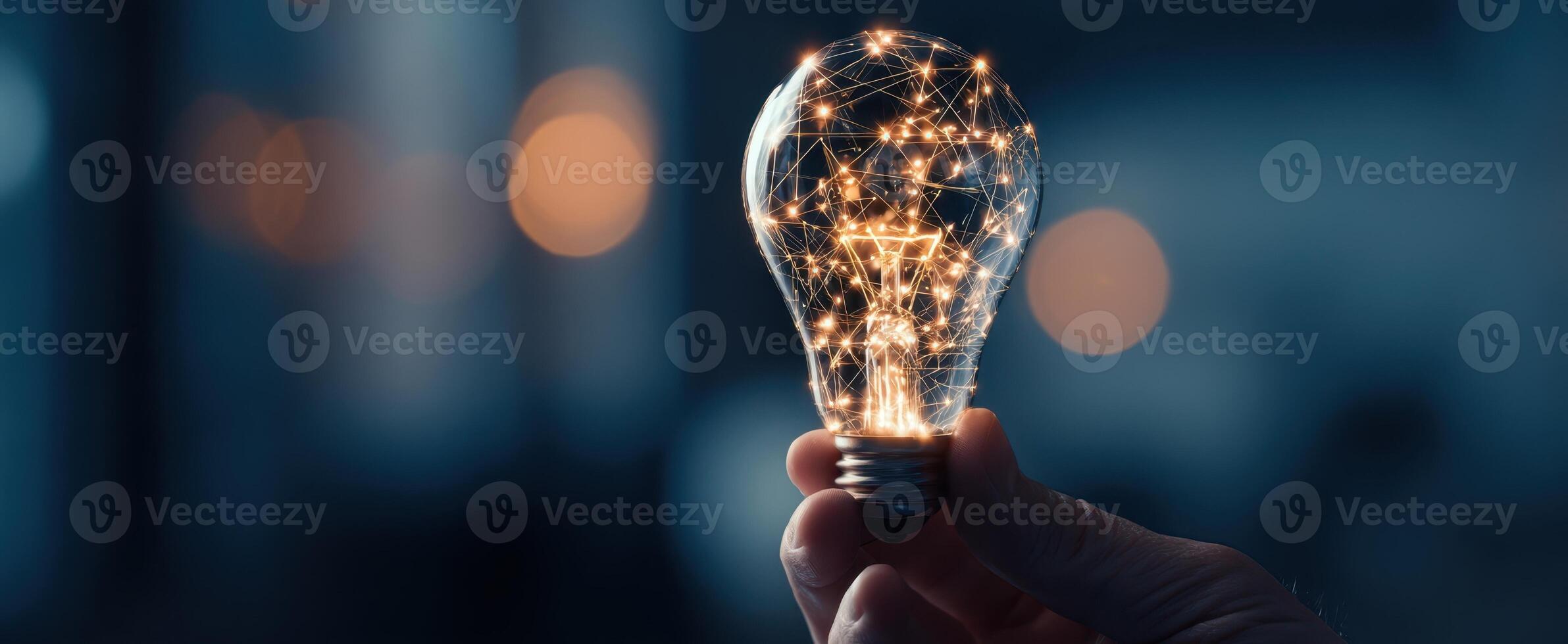 The luminous light bulb representing innovative ideas and creativity in a digital world. photo