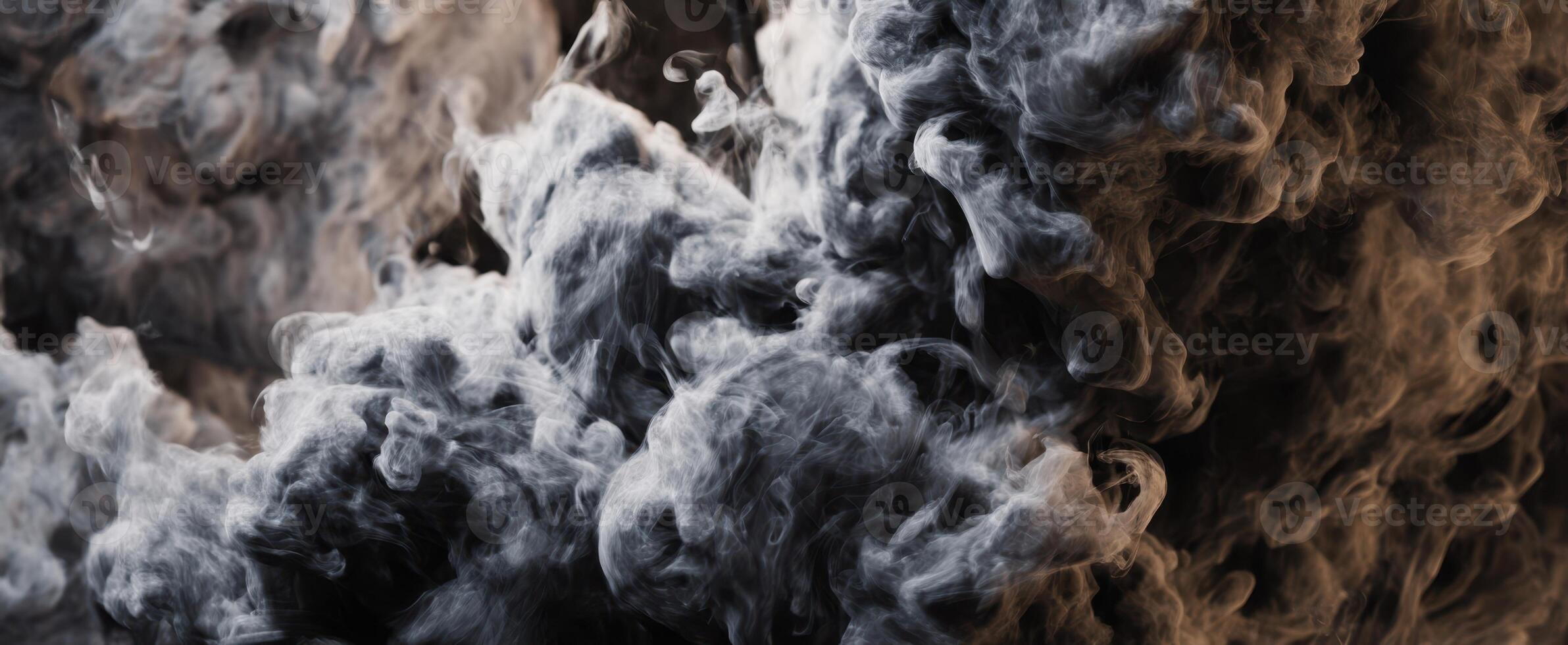 The mesmerizing movement of swirling smoke in dramatic contrast. photo