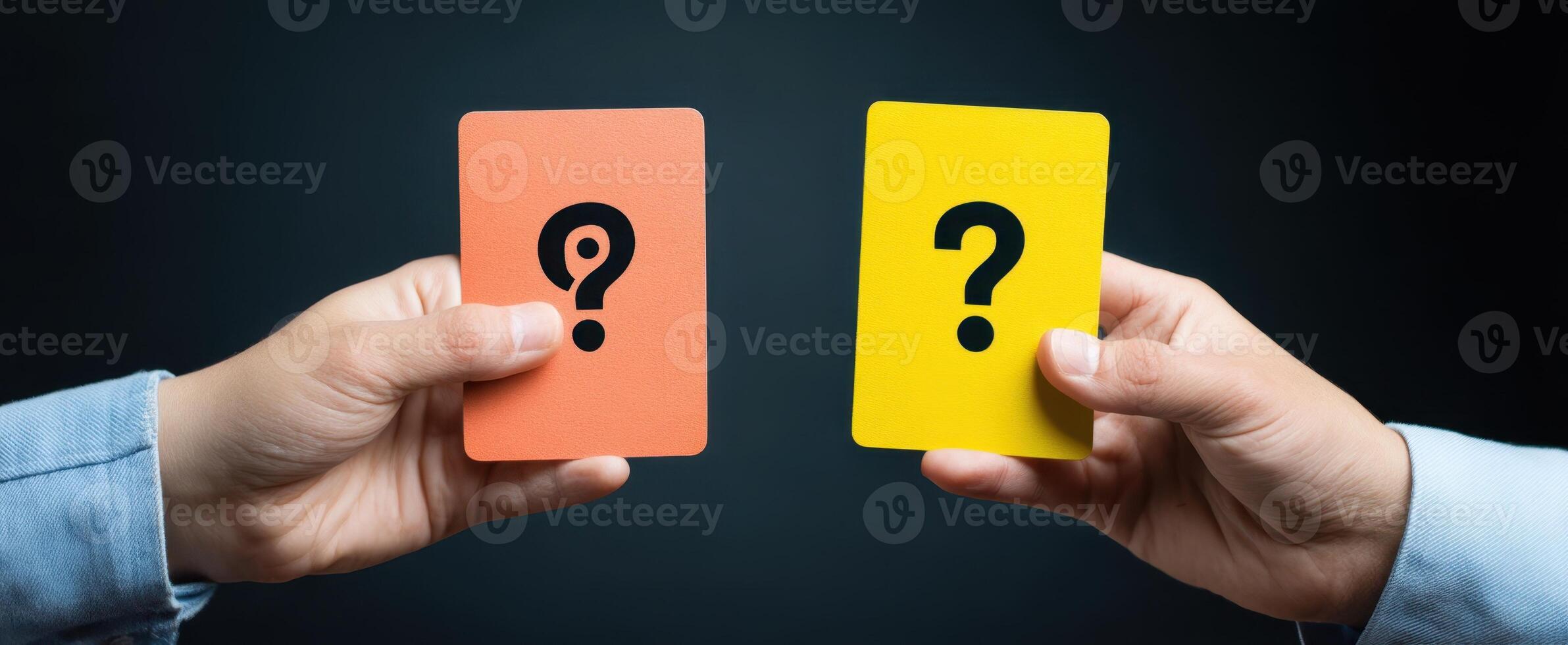 The hands holding colorful question cards symbolizing decision-making and choice. photo