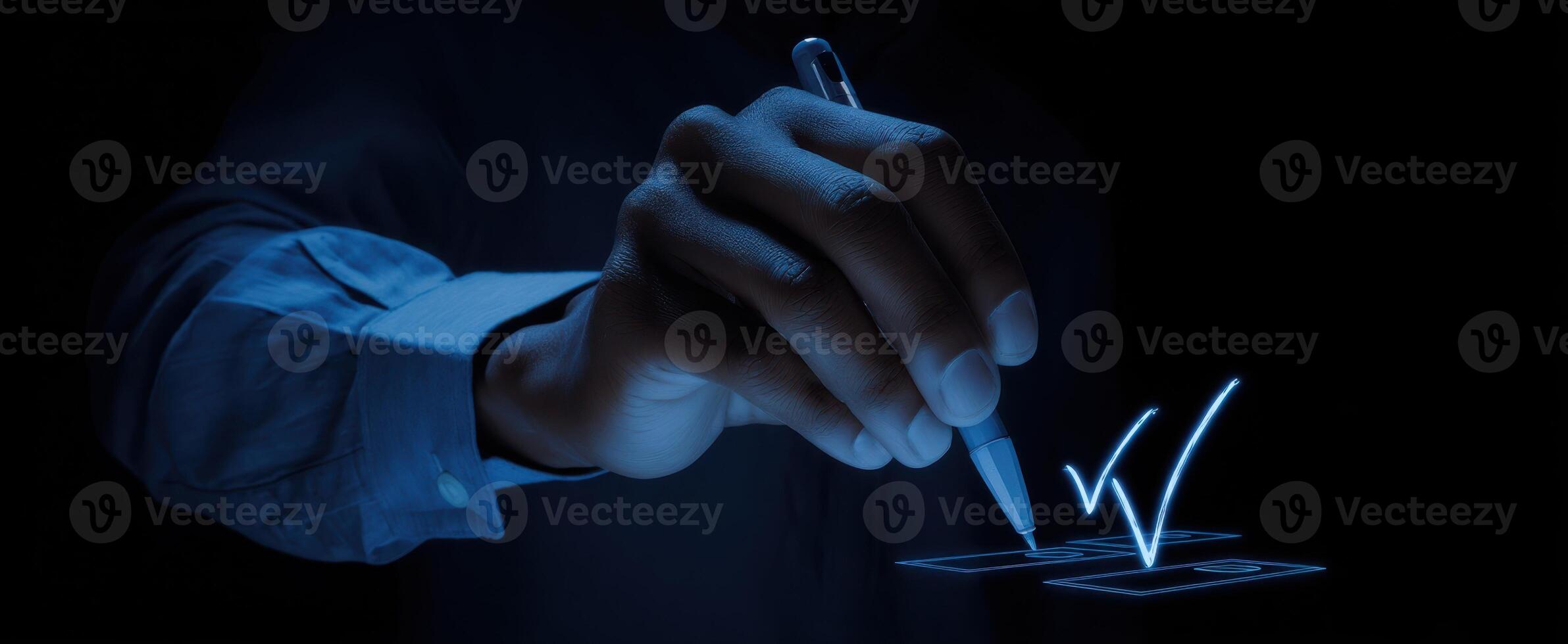 The hand writing a digital checkmark in a modern interface design. photo
