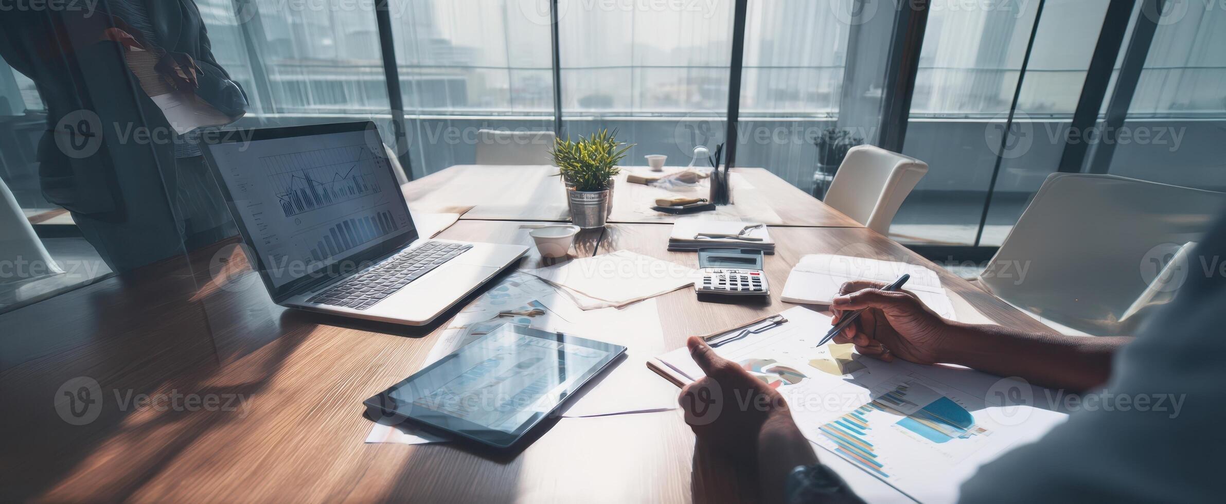 The modern office workspace featuring documents and digital devices for collaboration. photo