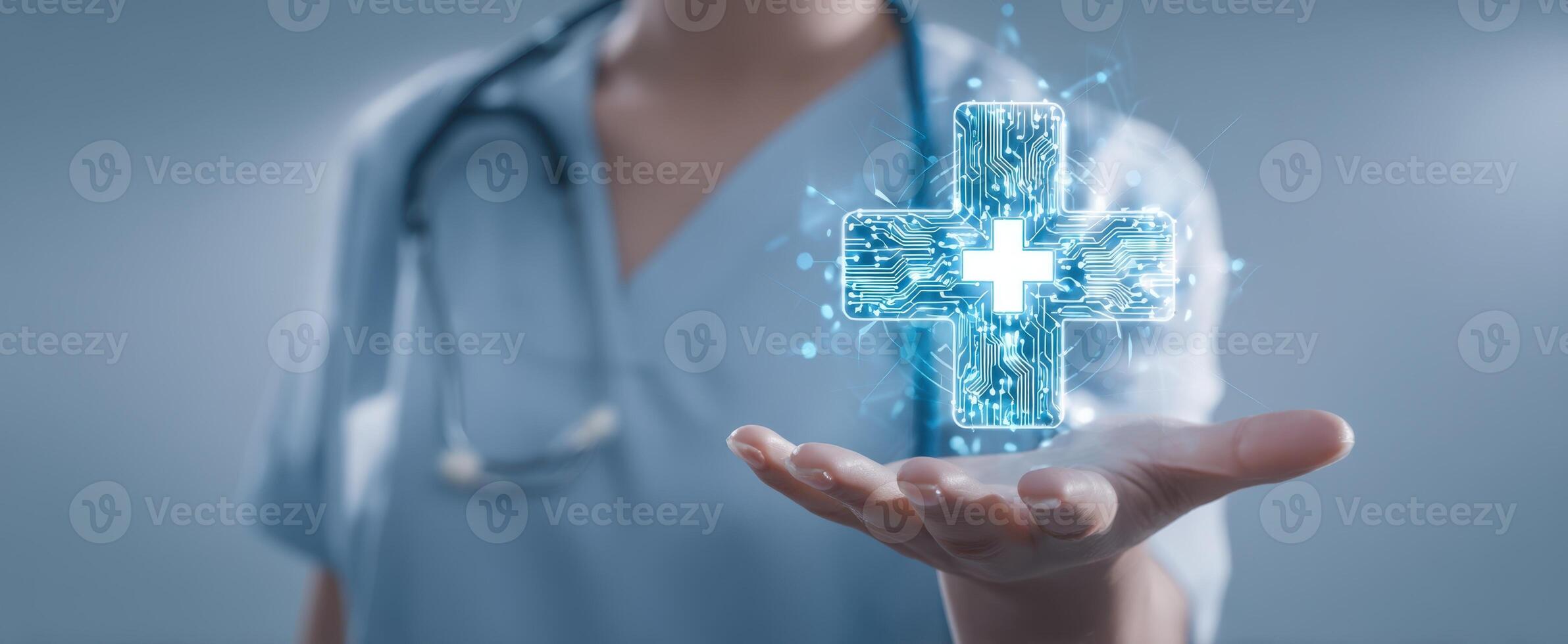 The healthcare professional presenting a digital medical cross in their hand. photo