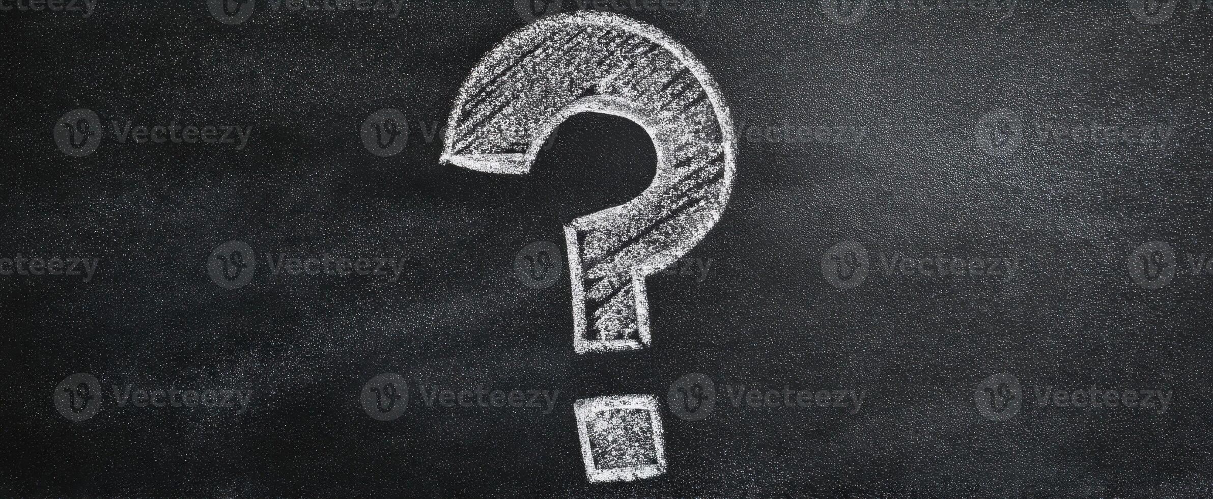 The Question Mark on a Chalkboard Symbolizing Inquiry and Curiosity photo