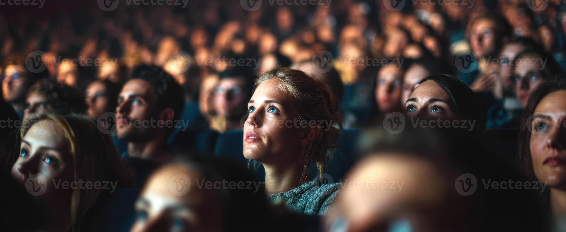 The Intense Focus of an Engaged Audience Watching a Film photo
