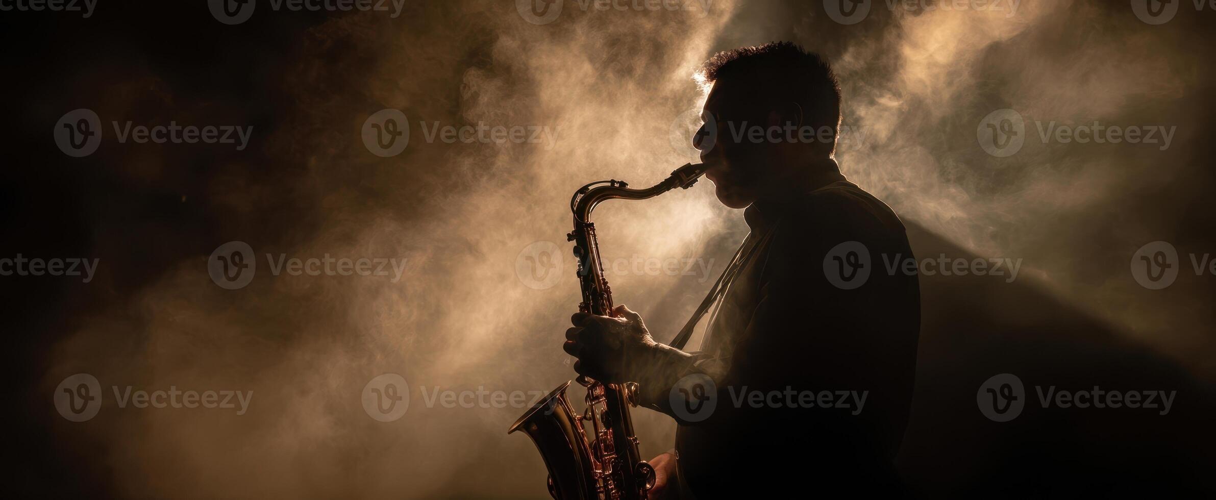 The saxophone player creates a mesmerizing atmosphere in smoky ambiance. photo