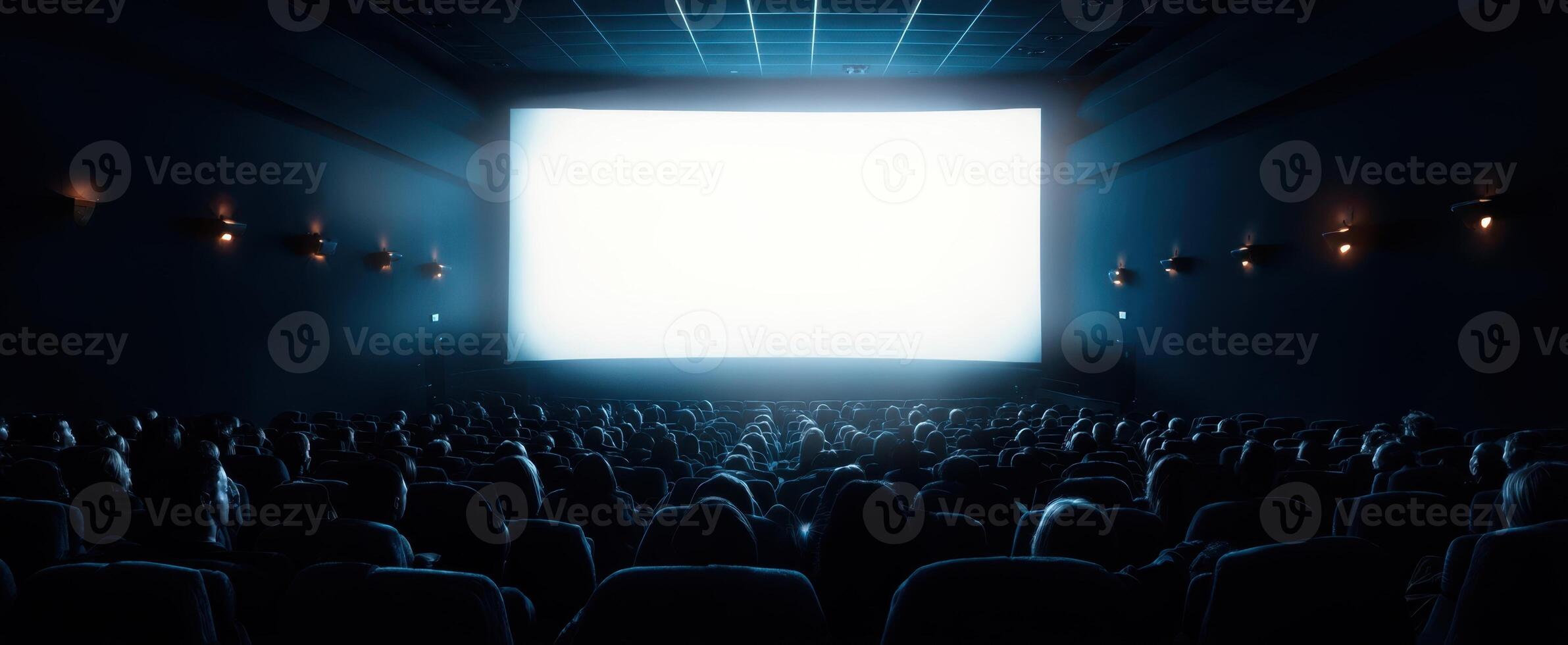 The empty cinema with bright screen awaiting an exciting movie experience. photo