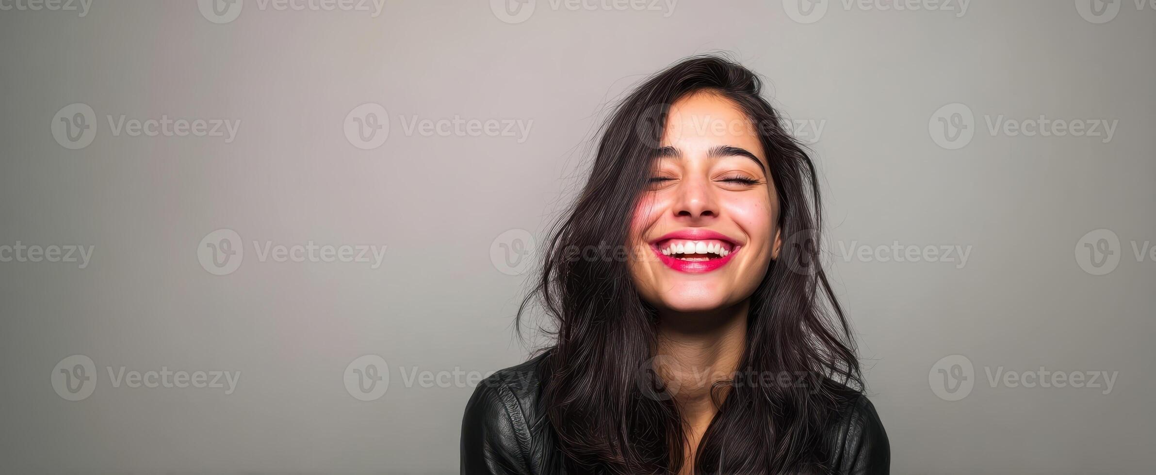 The joyful woman embracing life with a radiant smile and warm personality photo