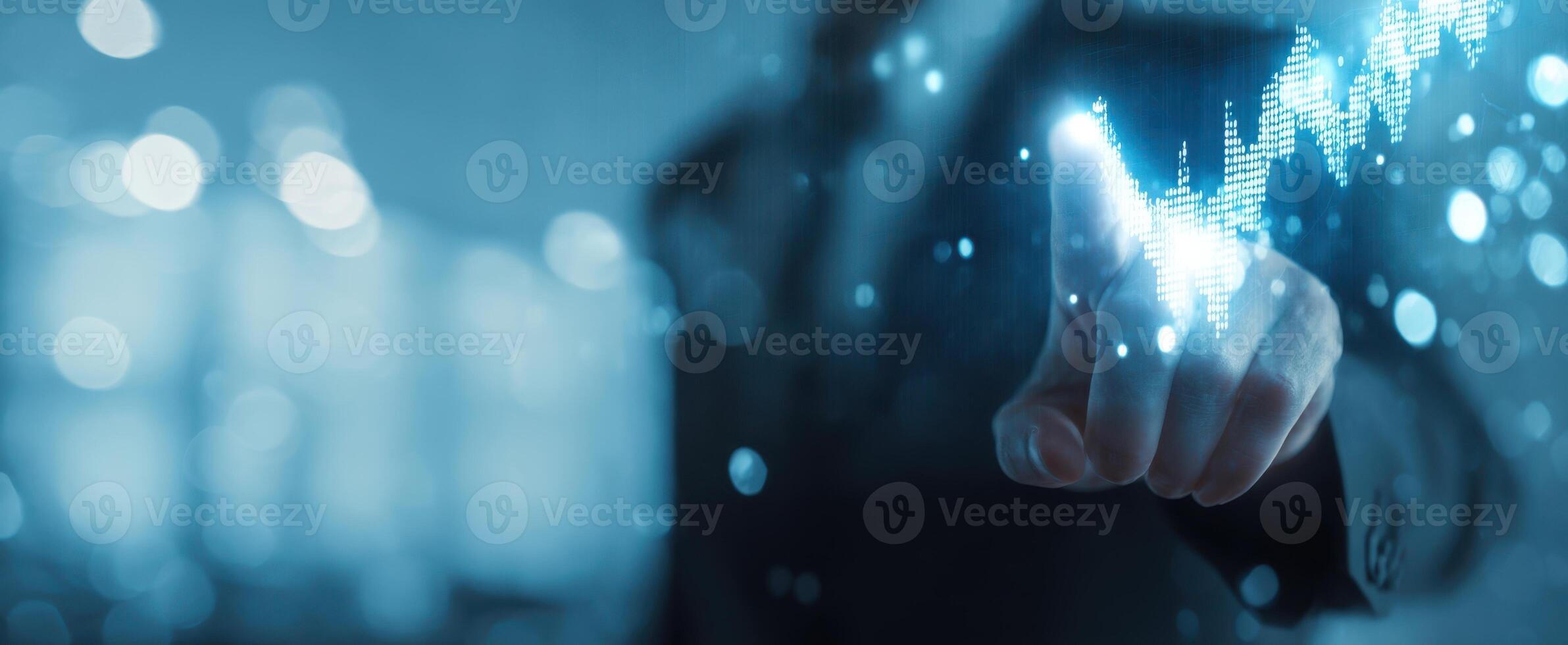 The business professional interacting with digital financial graph on screen. photo
