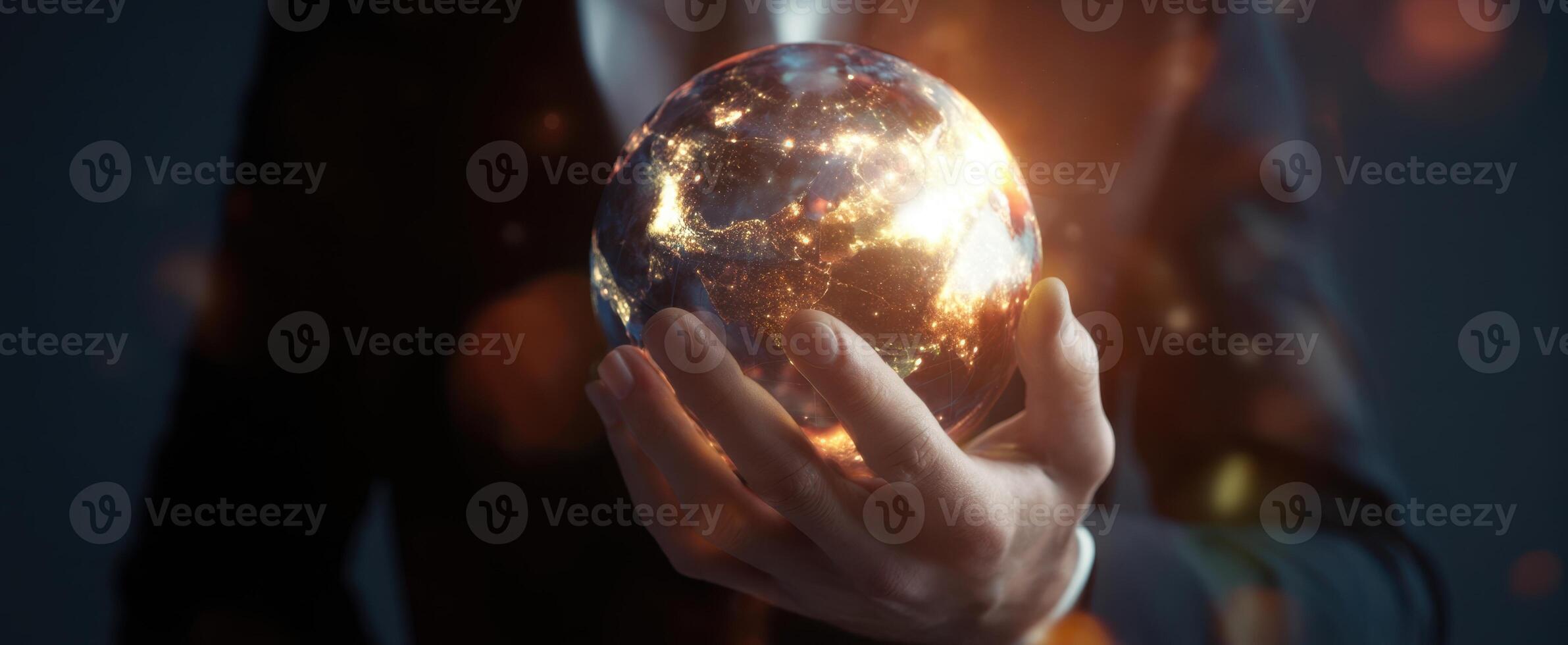 The business professional holding a glowing globe representing global connectivity and innovation. photo