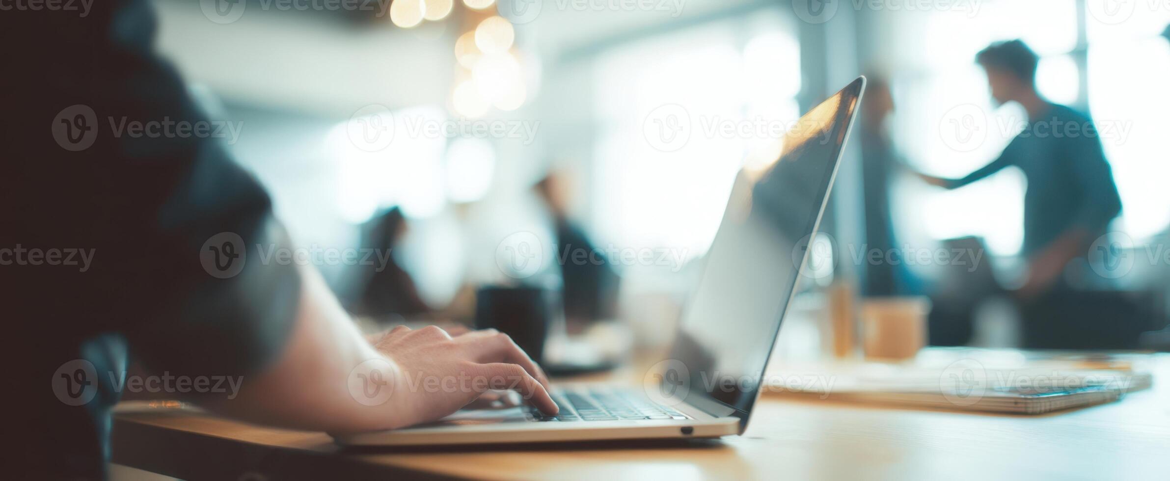 The laptop on a modern workspace captures a moment of productivity and creativity. photo
