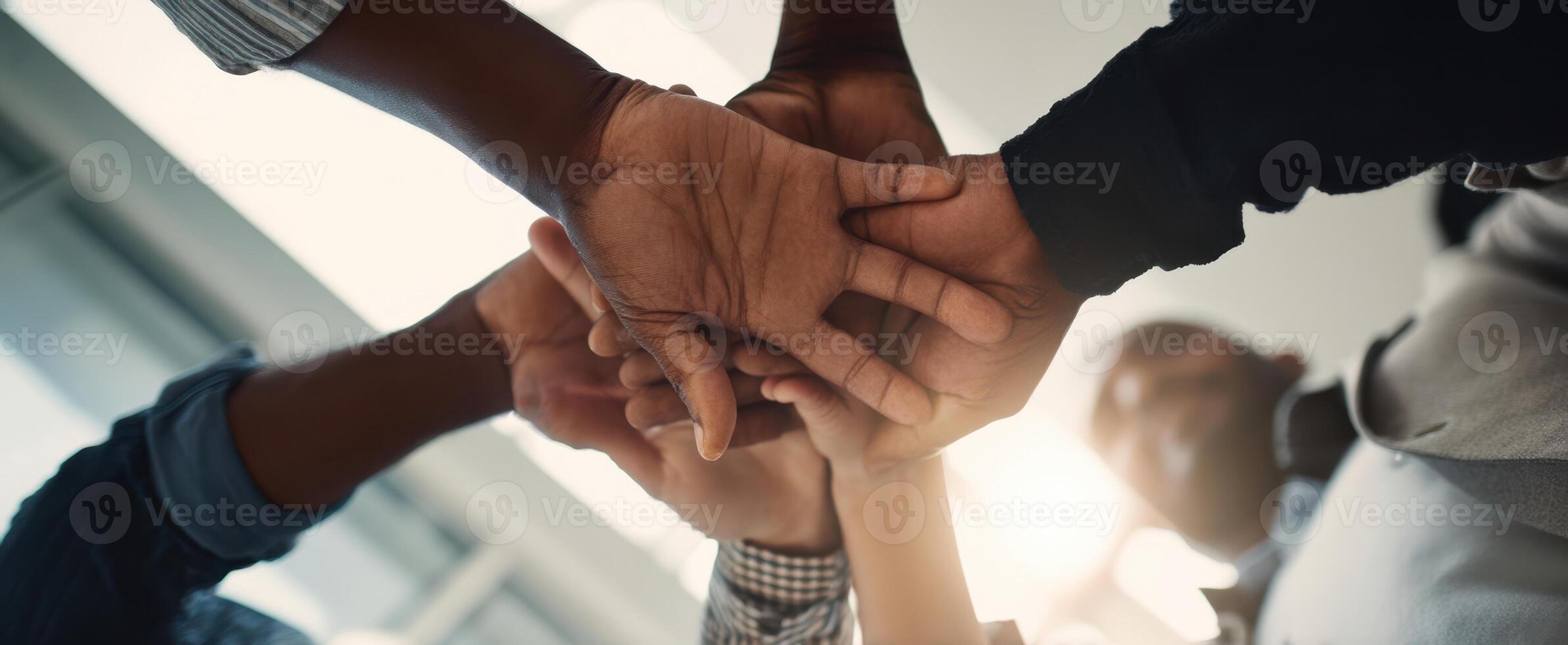 The Hands of Teamwork Coming Together in Unity and Collaboration photo