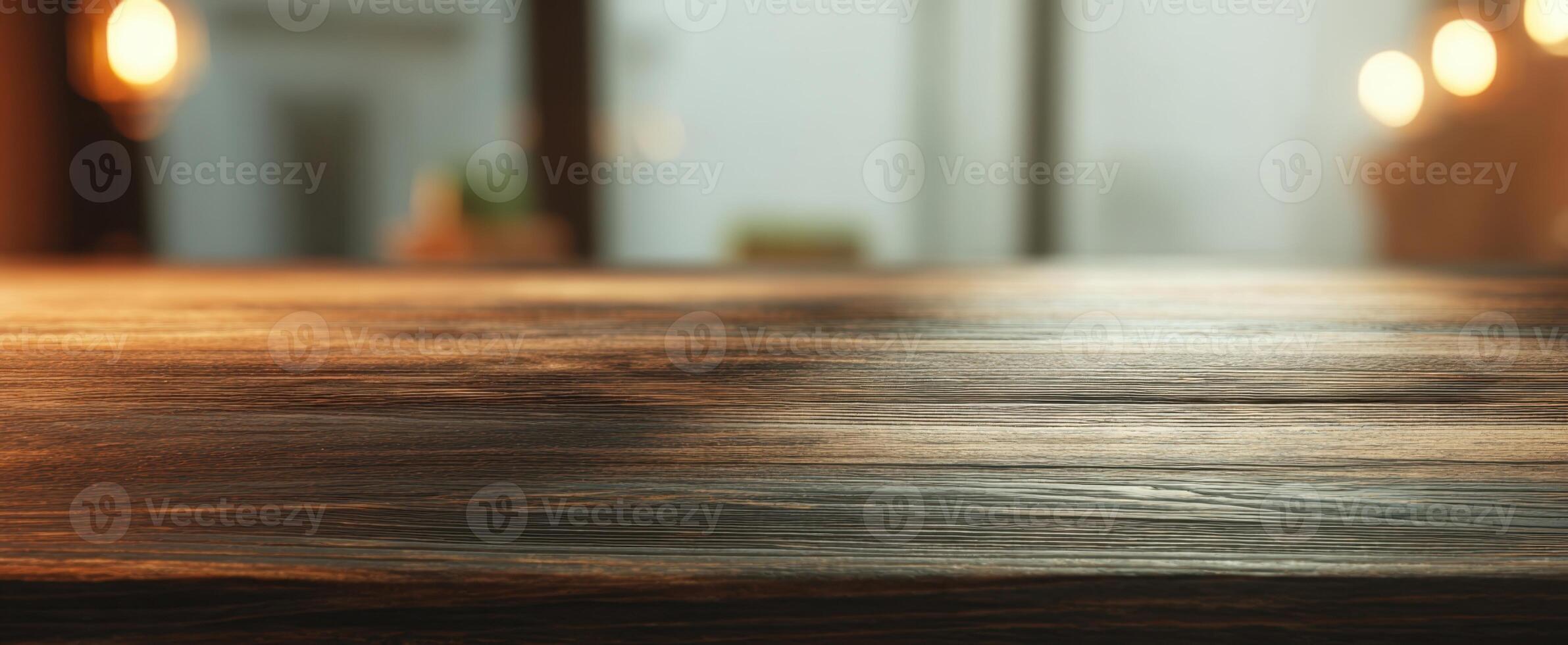 The exquisite wooden table capturing warm light in a cozy interior setting. photo