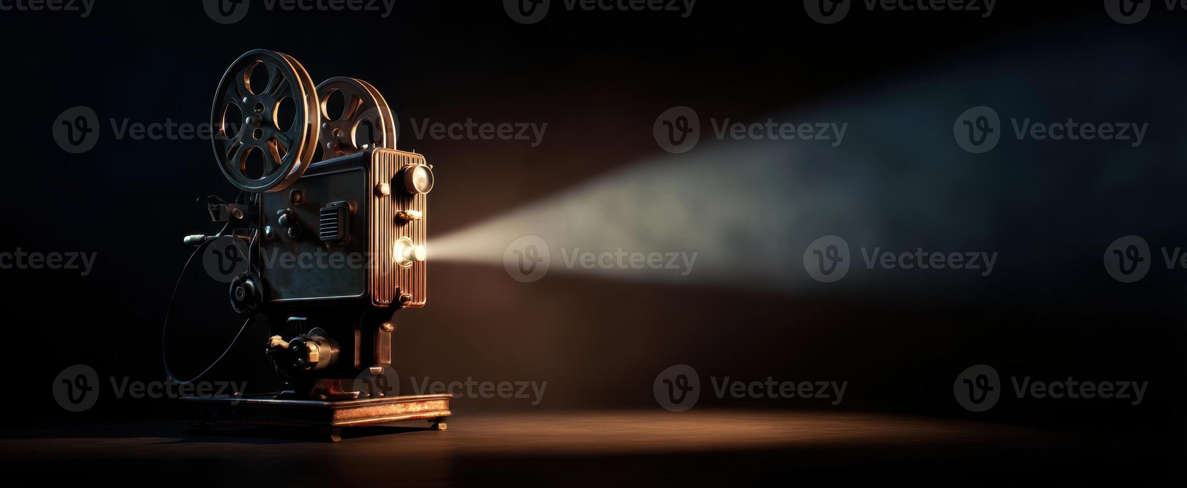 The vintage cinema projector illuminating a dark room with nostalgic charm. photo