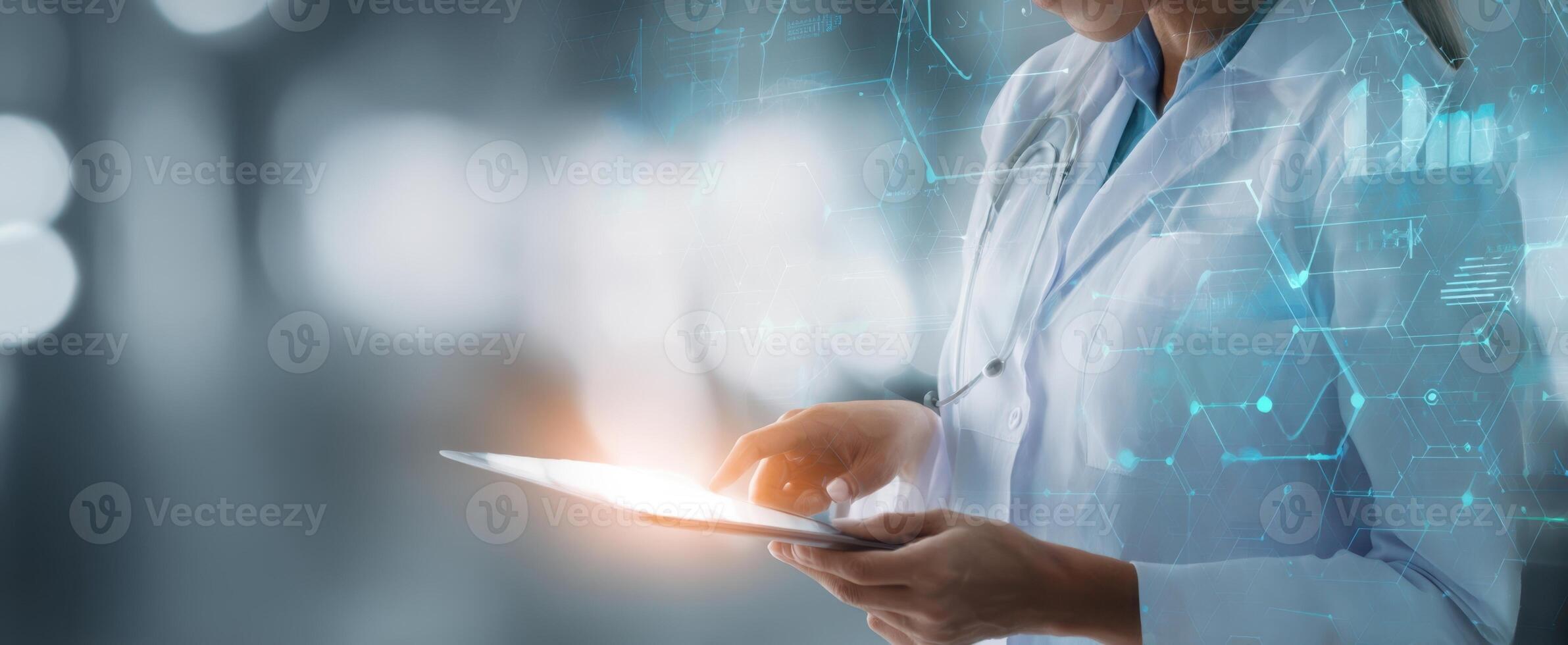 The doctor using a tablet with advanced digital technology in healthcare. photo