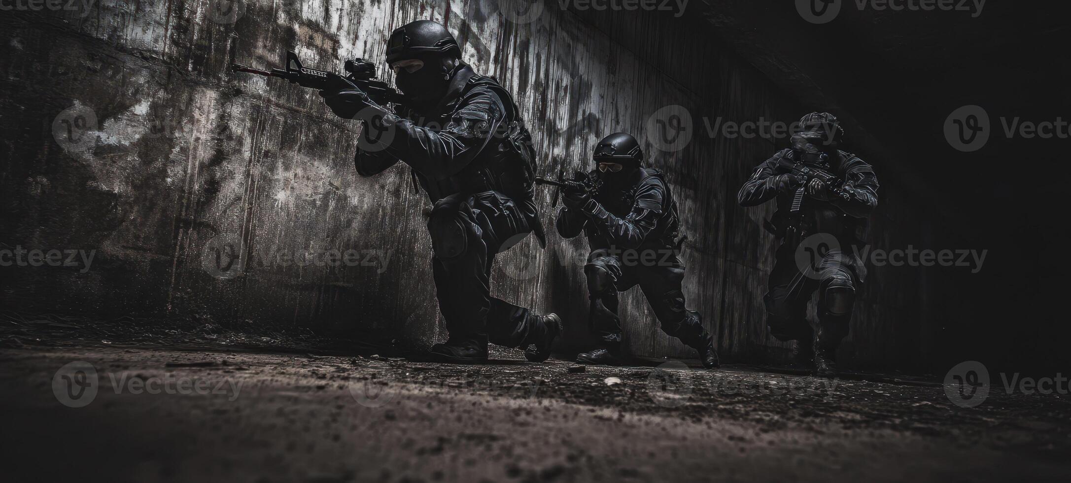 The soldiers executing a tactical maneuver in a dimly lit environment. photo