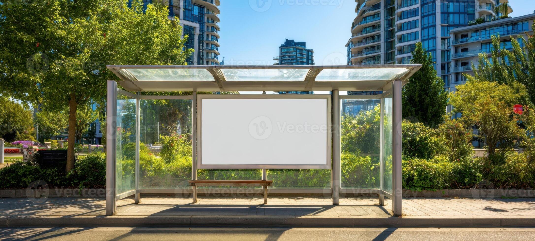 The modern bus shelter surrounded by greenery and tall buildings in a vibrant city. photo