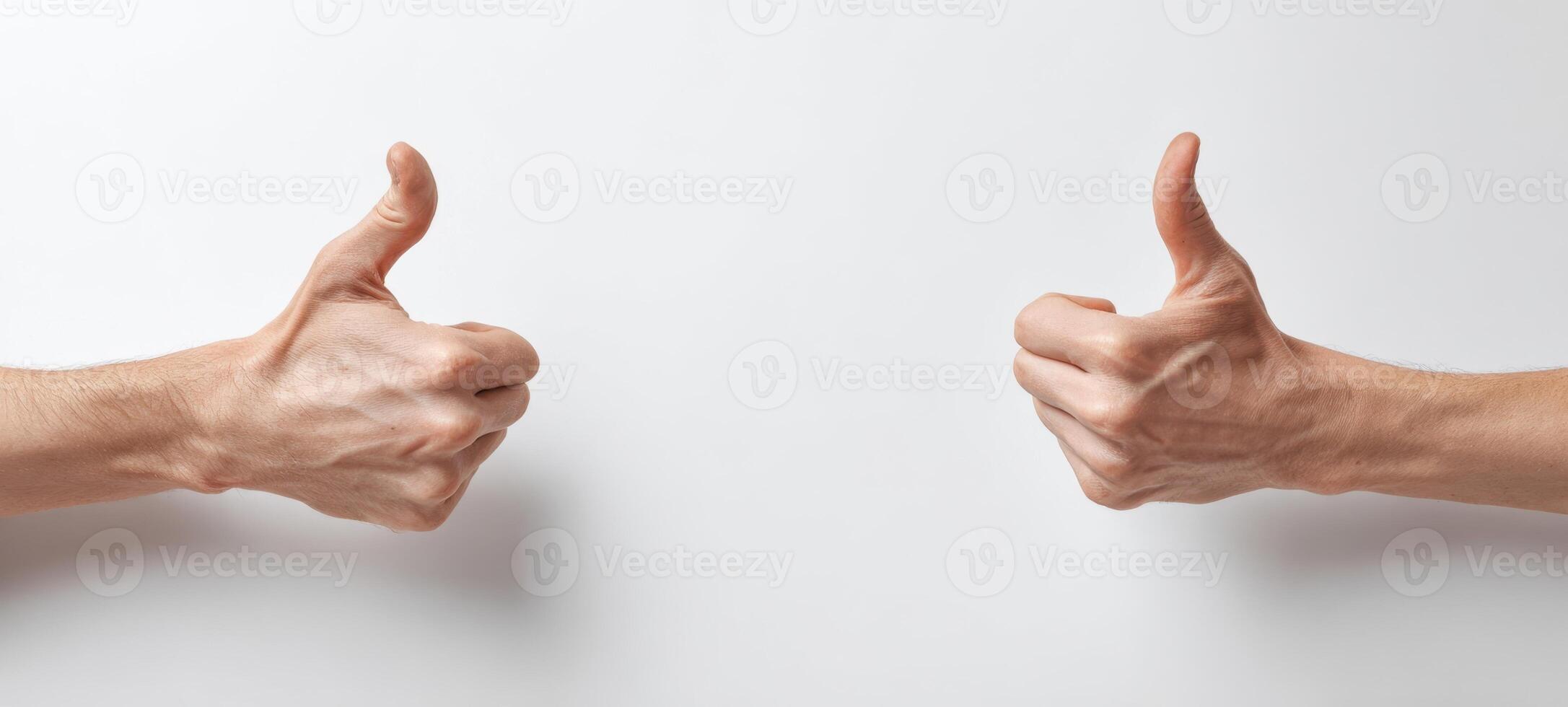 The thumbs up gesture symbolizing approval and positive communication between individuals. photo