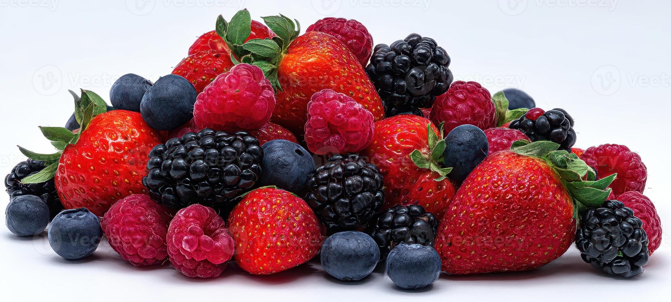 The colorful assortment of fresh berries in an appetizing arrangement. photo
