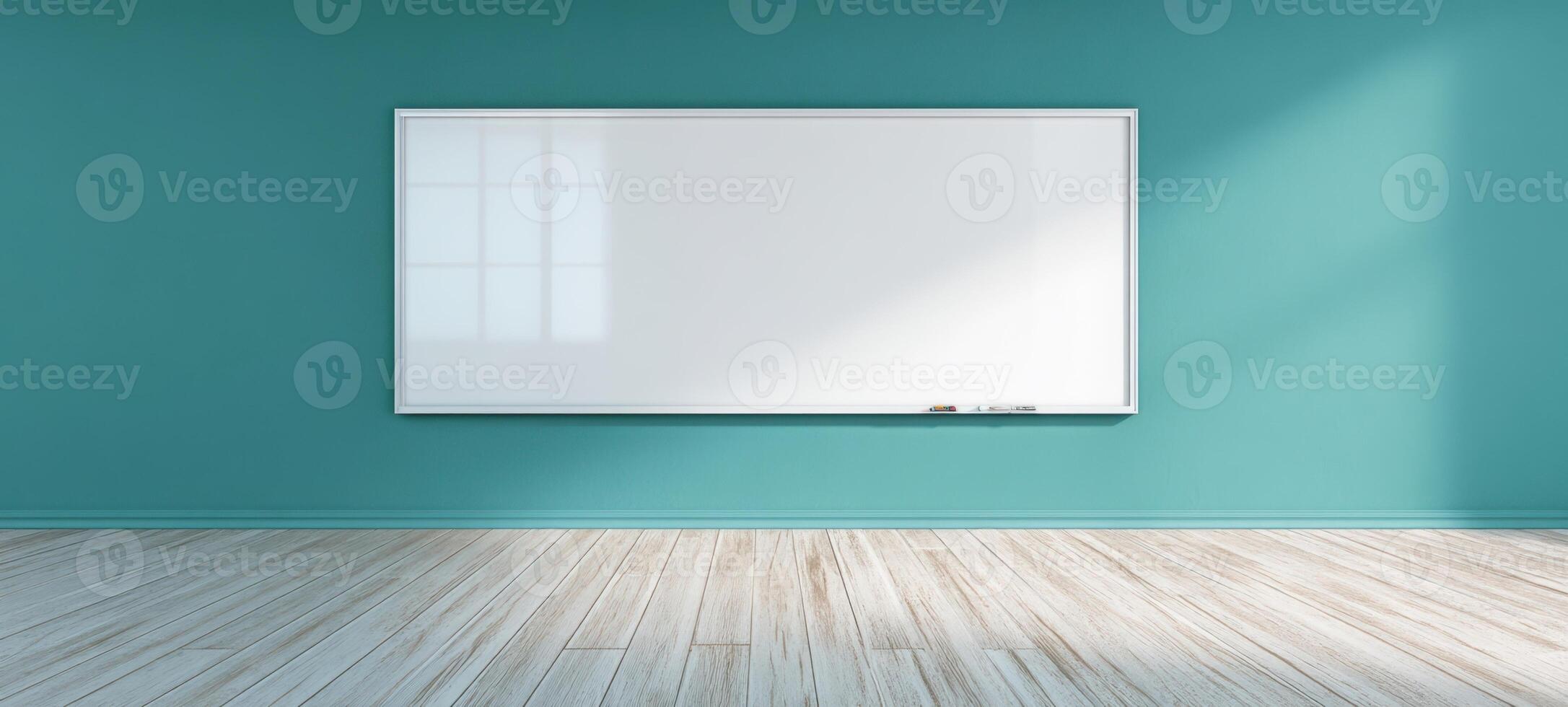 The bright whiteboard on a turquoise wall in a modern classroom setting. photo