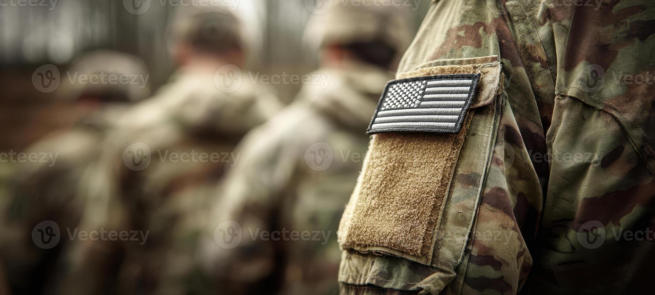 The soldiers showcasing unity and pride in their military uniforms with American patches. photo