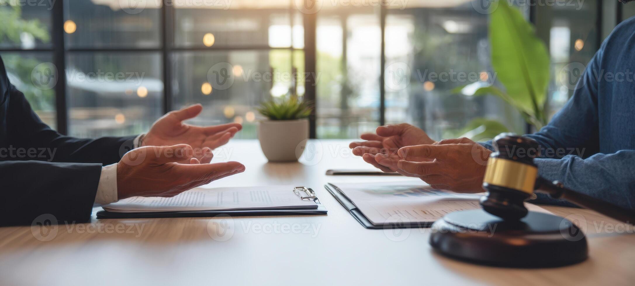 The negotiation process between legal professionals at a contemporary office setting. photo