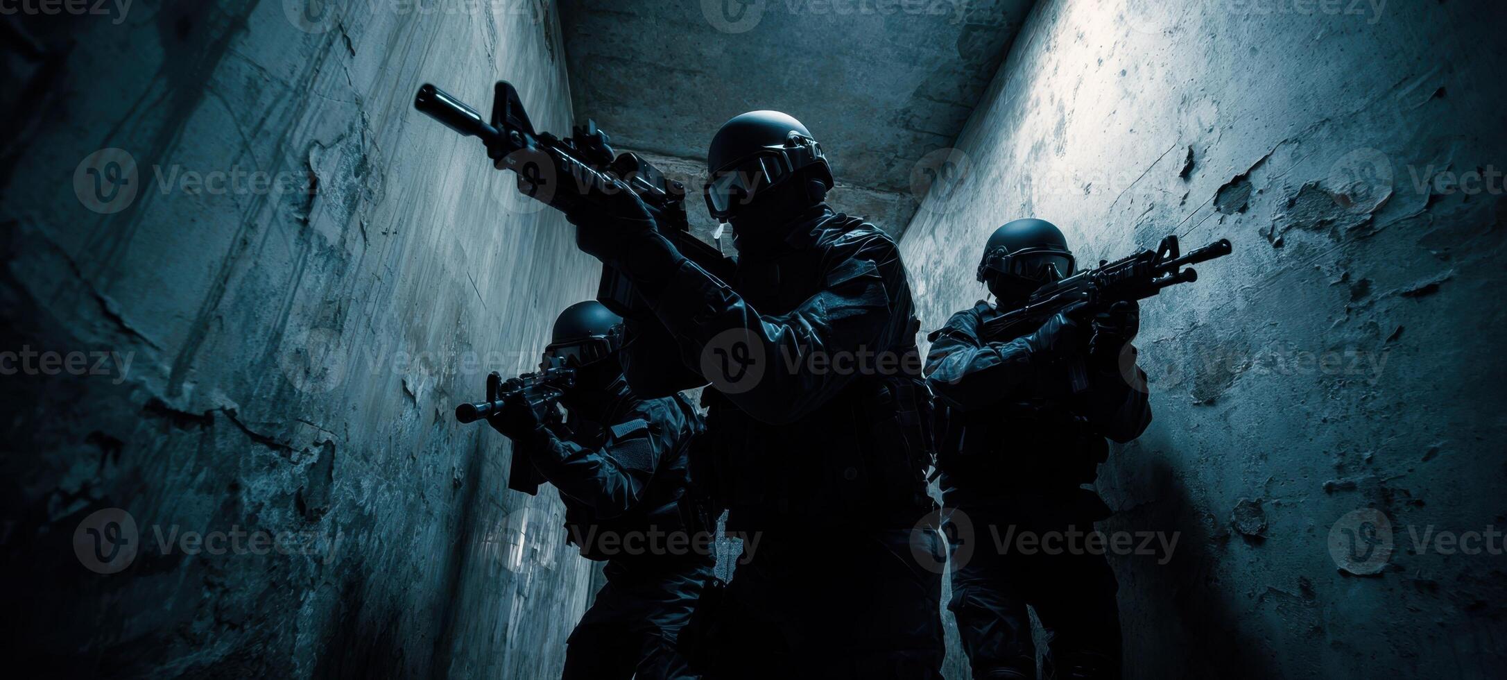 The soldiers prepare for a tactical operation in a dimly lit corridor. photo