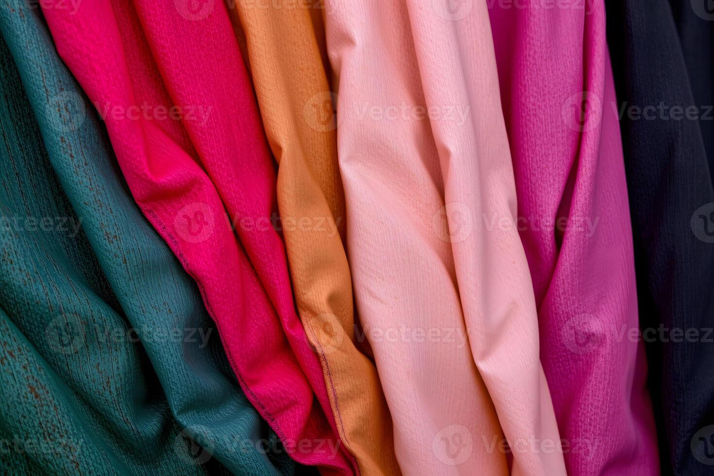 Vibrant Textured Fabrics Collection Teal Pink Orange and Burgundy Draped Textiles photo
