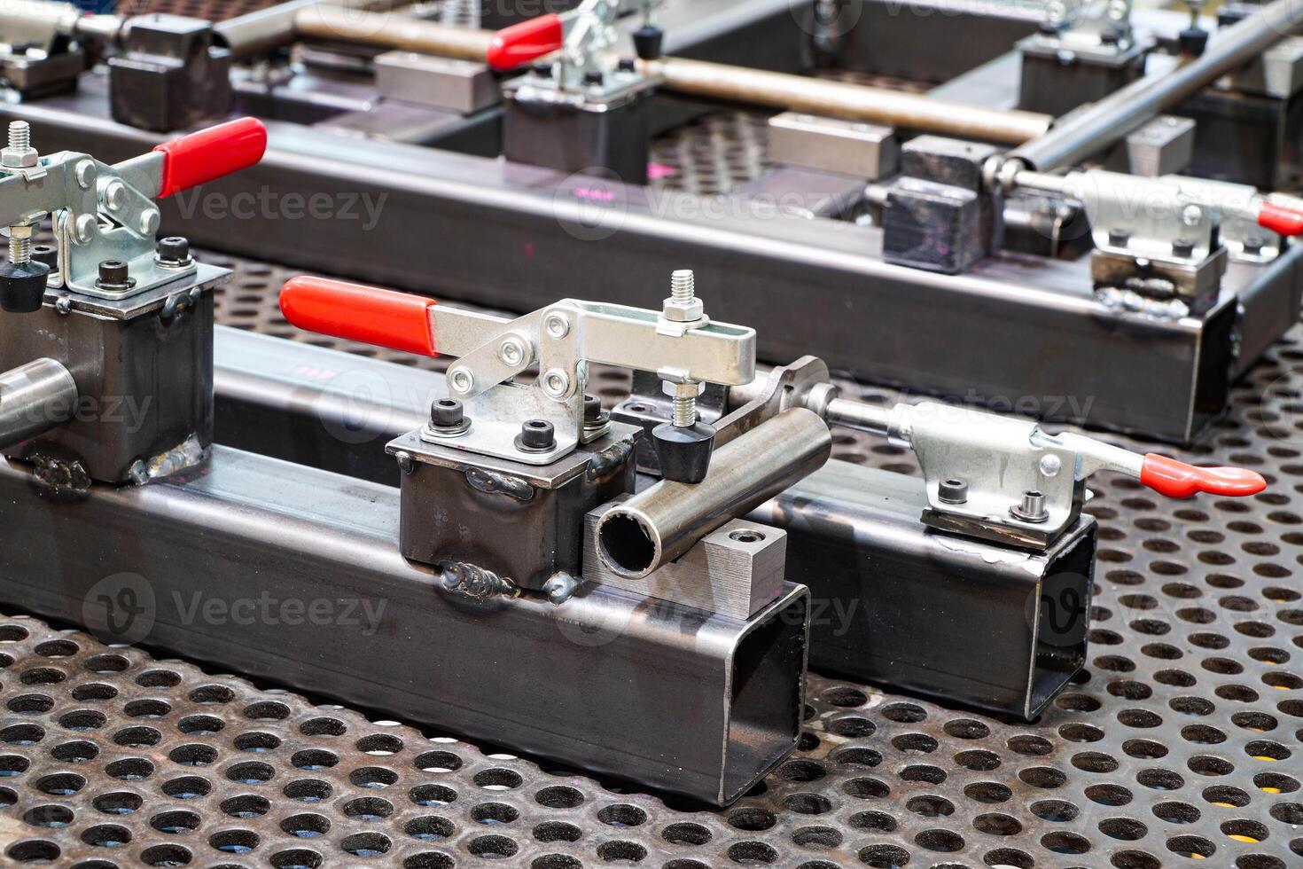 Toggle clamp for locking welding machine parts.For clamping workpieces and inspection JIGs. photo