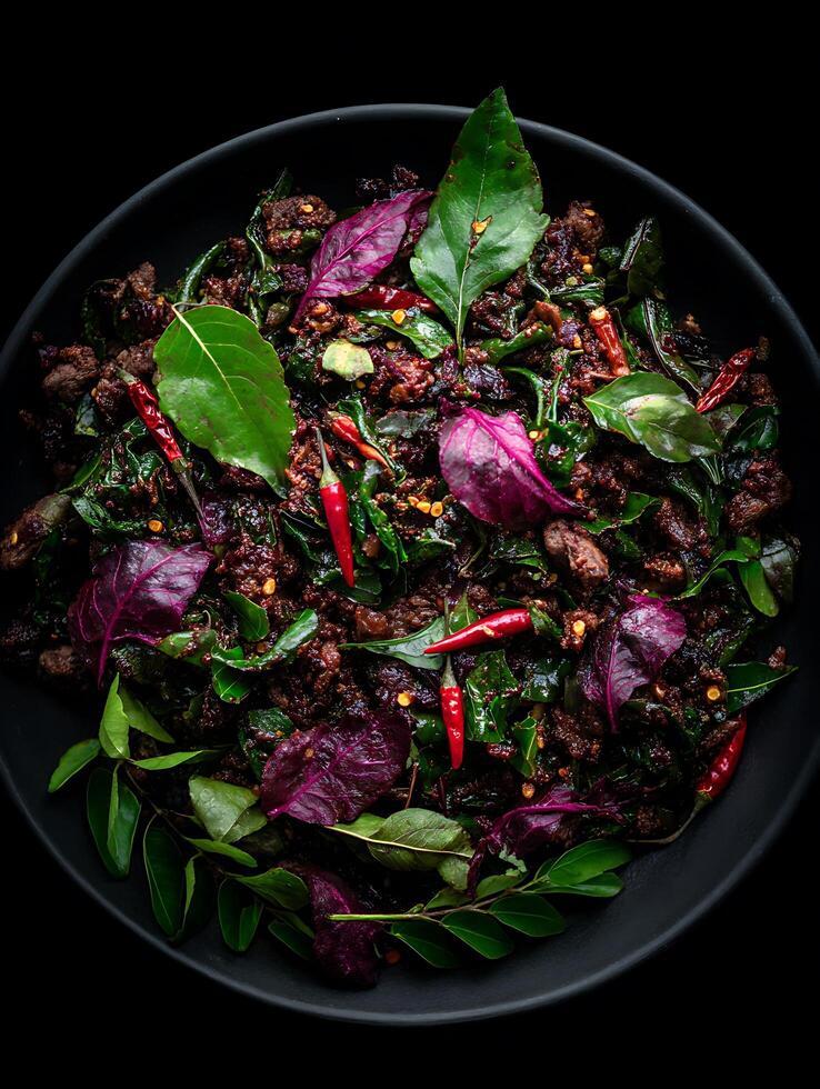 Spicy Beef Stir-fry with Red Amaranth and Chili Peppers A Culinary Delight. photo