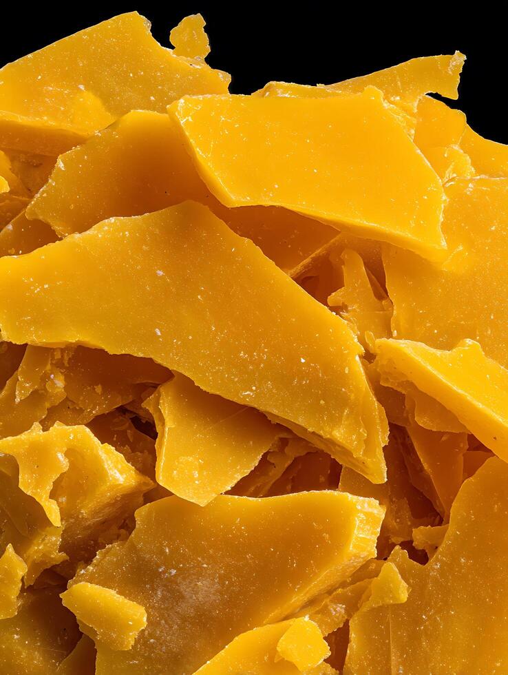 Close Up of Yellow Beeswax Pieces, Natural Texture and Color. photo