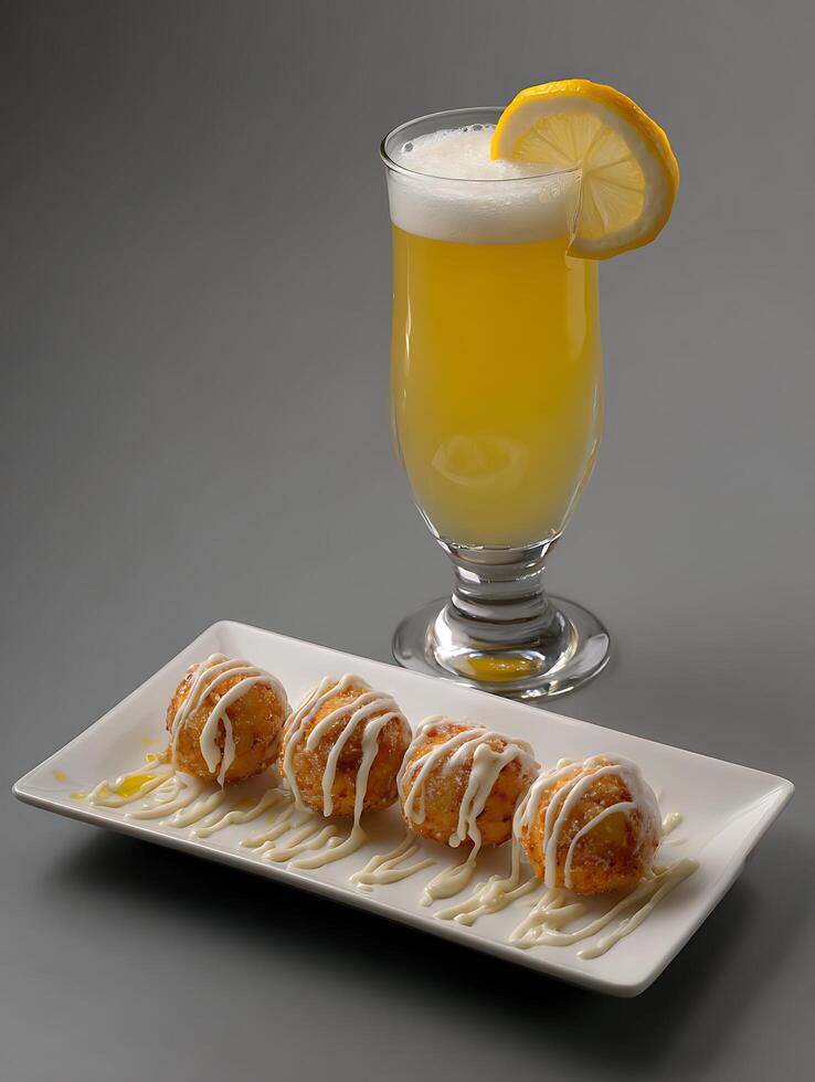 Gourmet Fried Dessert Balls with Lemon Beer Pairing. photo